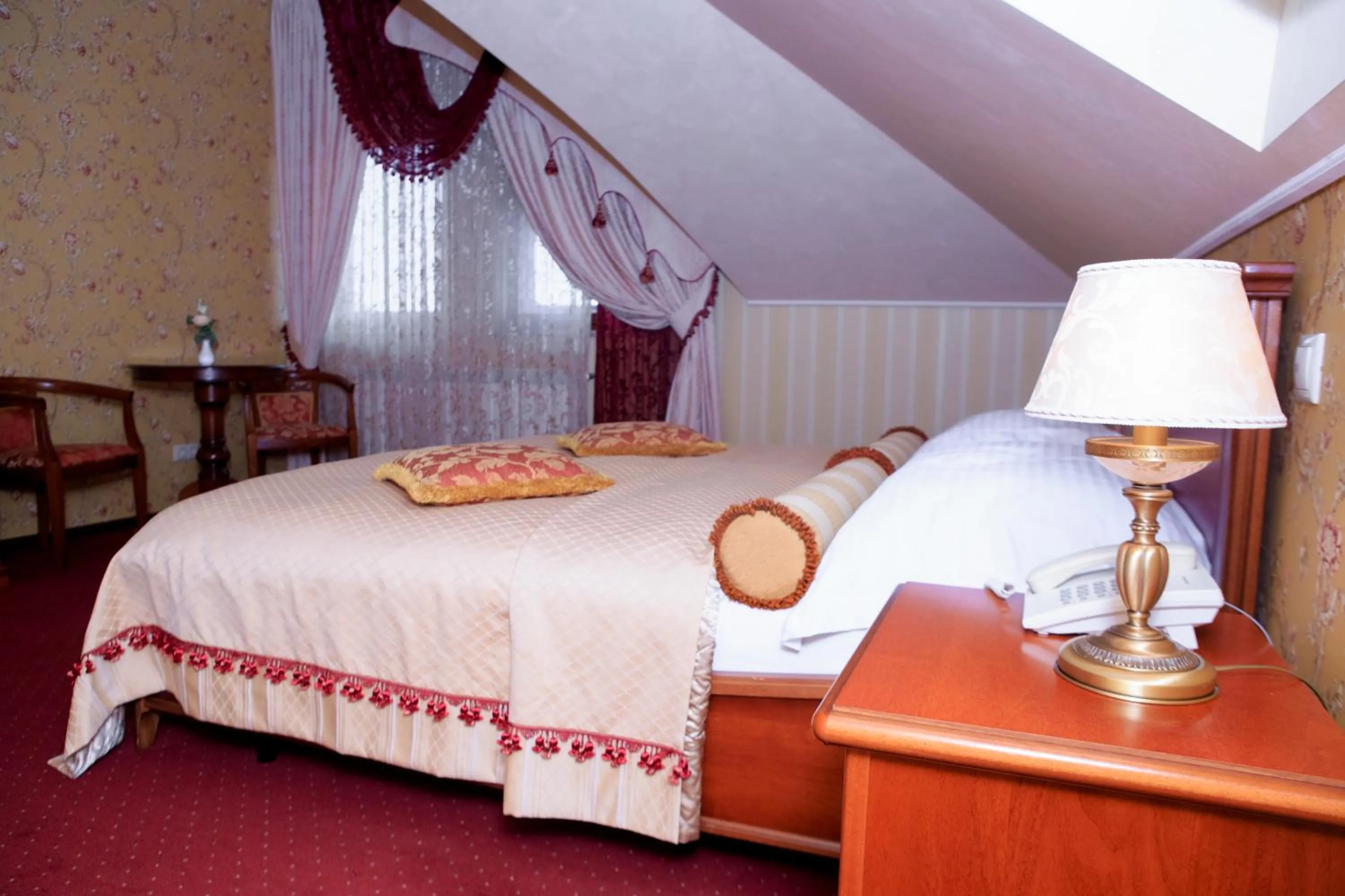 Bed in Hotel Elefant