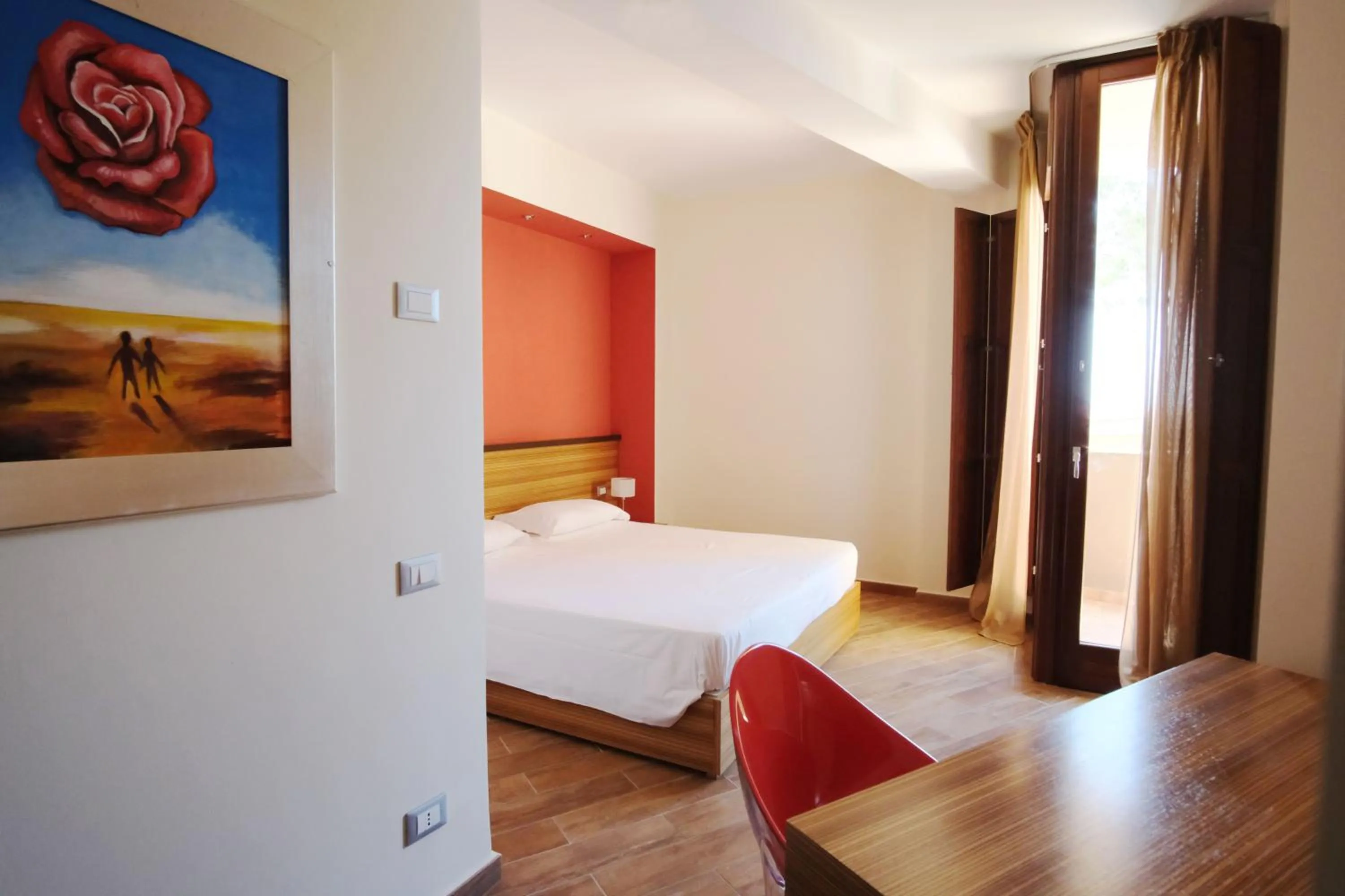 Bed in Nuraghe Apartments