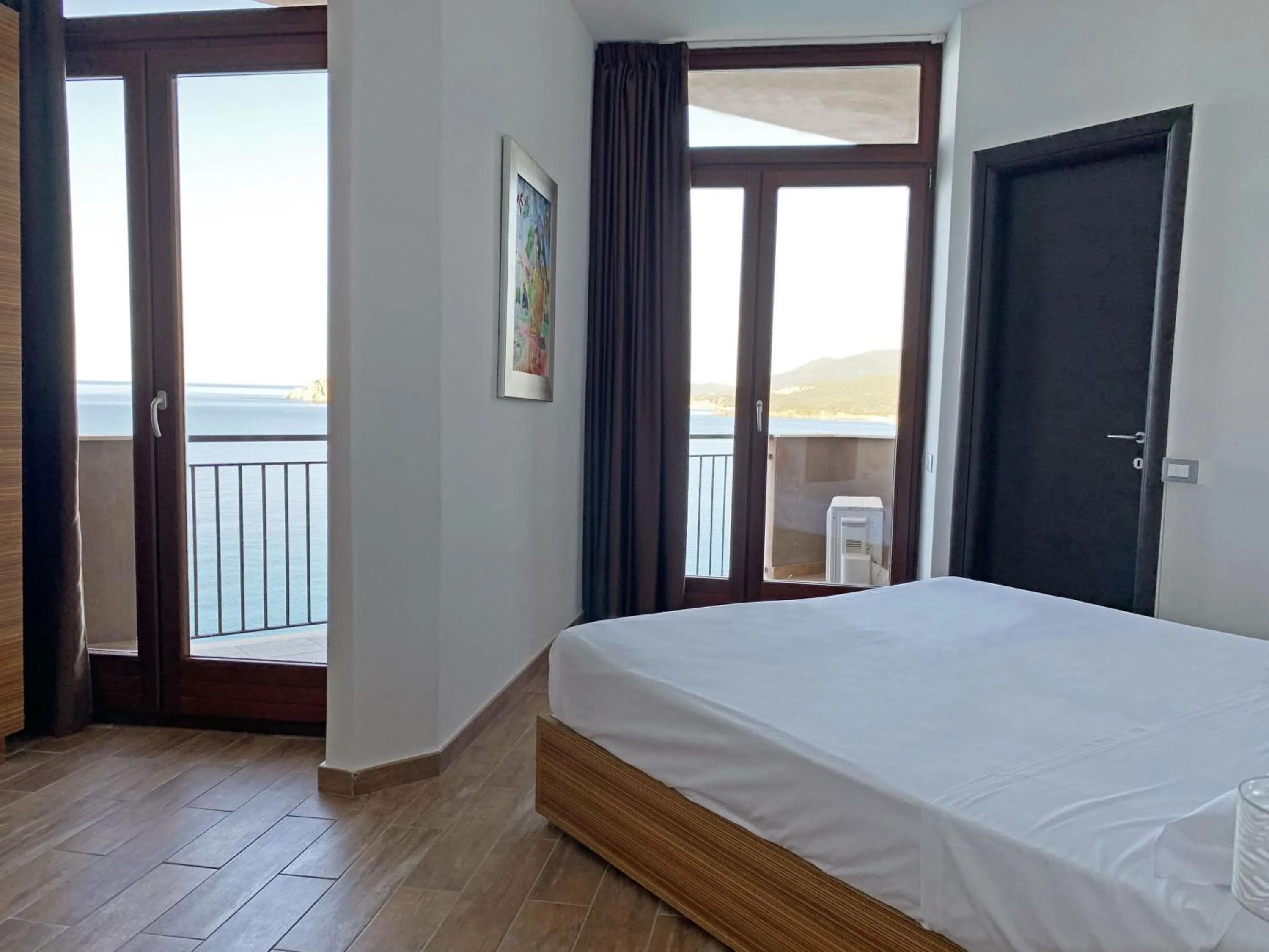 Bed in Nuraghe Apartments