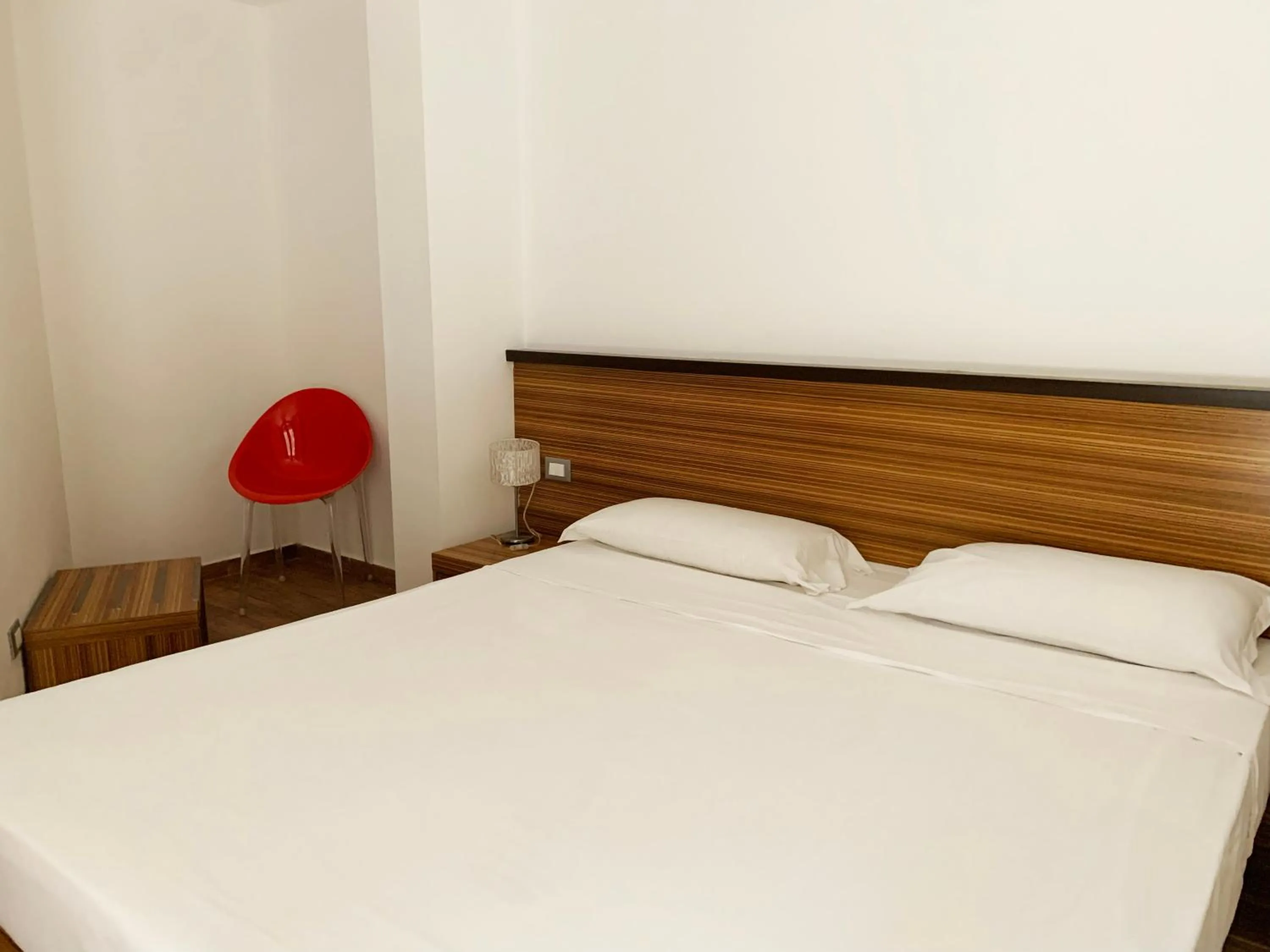 Bed in Nuraghe Apartments
