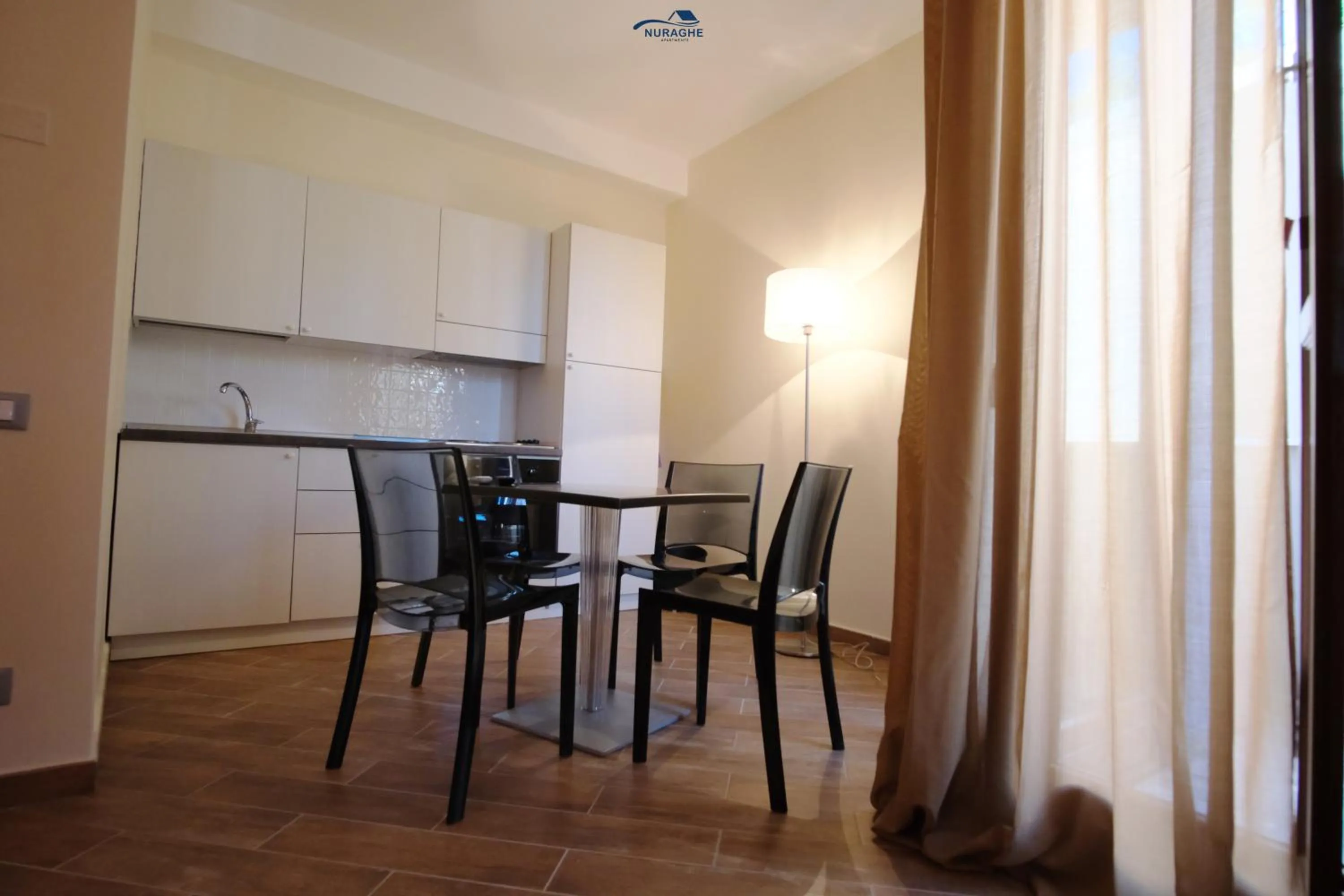 kitchen in Nuraghe Apartments