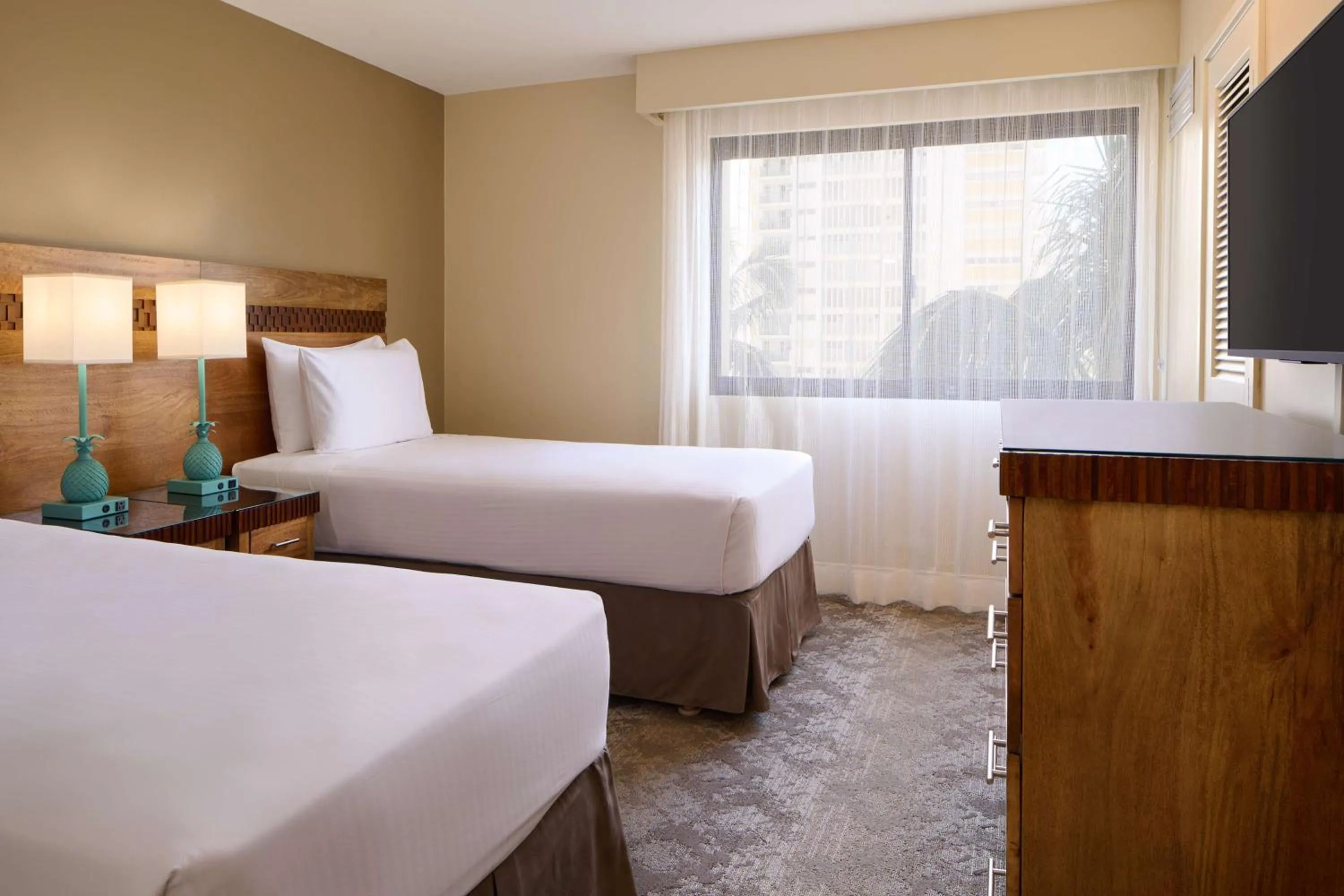 Bed in Aston Waikiki Beach Tower