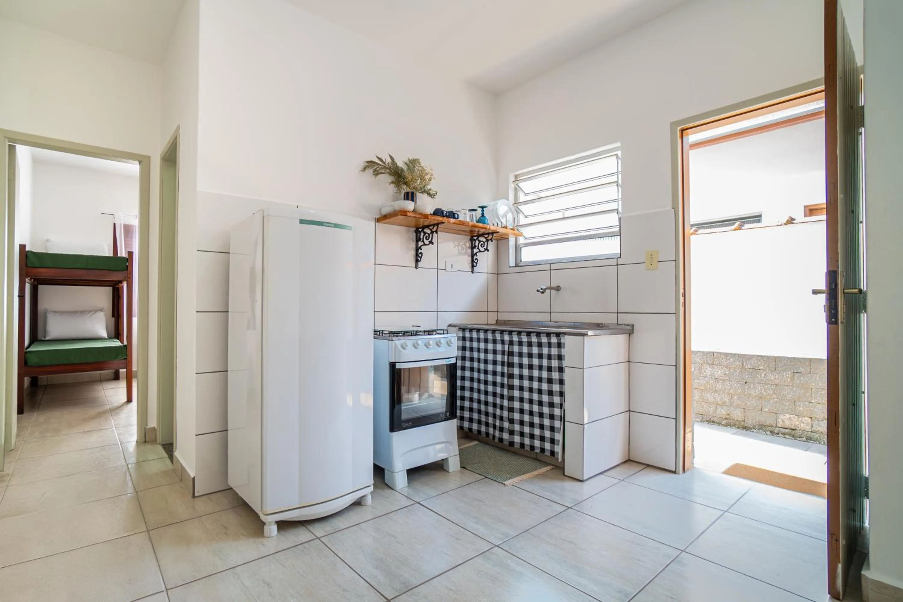 Kitchen or kitchenette in Chalés Canoas Ubatuba