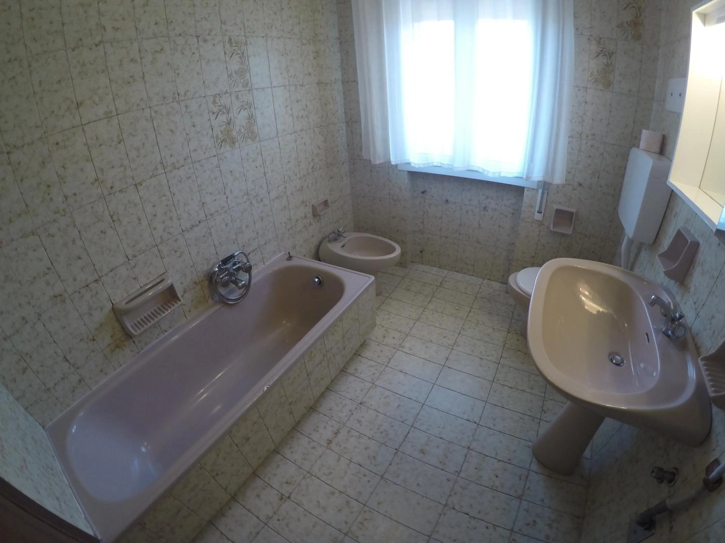 Bathroom in Residence Caorle Apartments - Agenzia Cocal