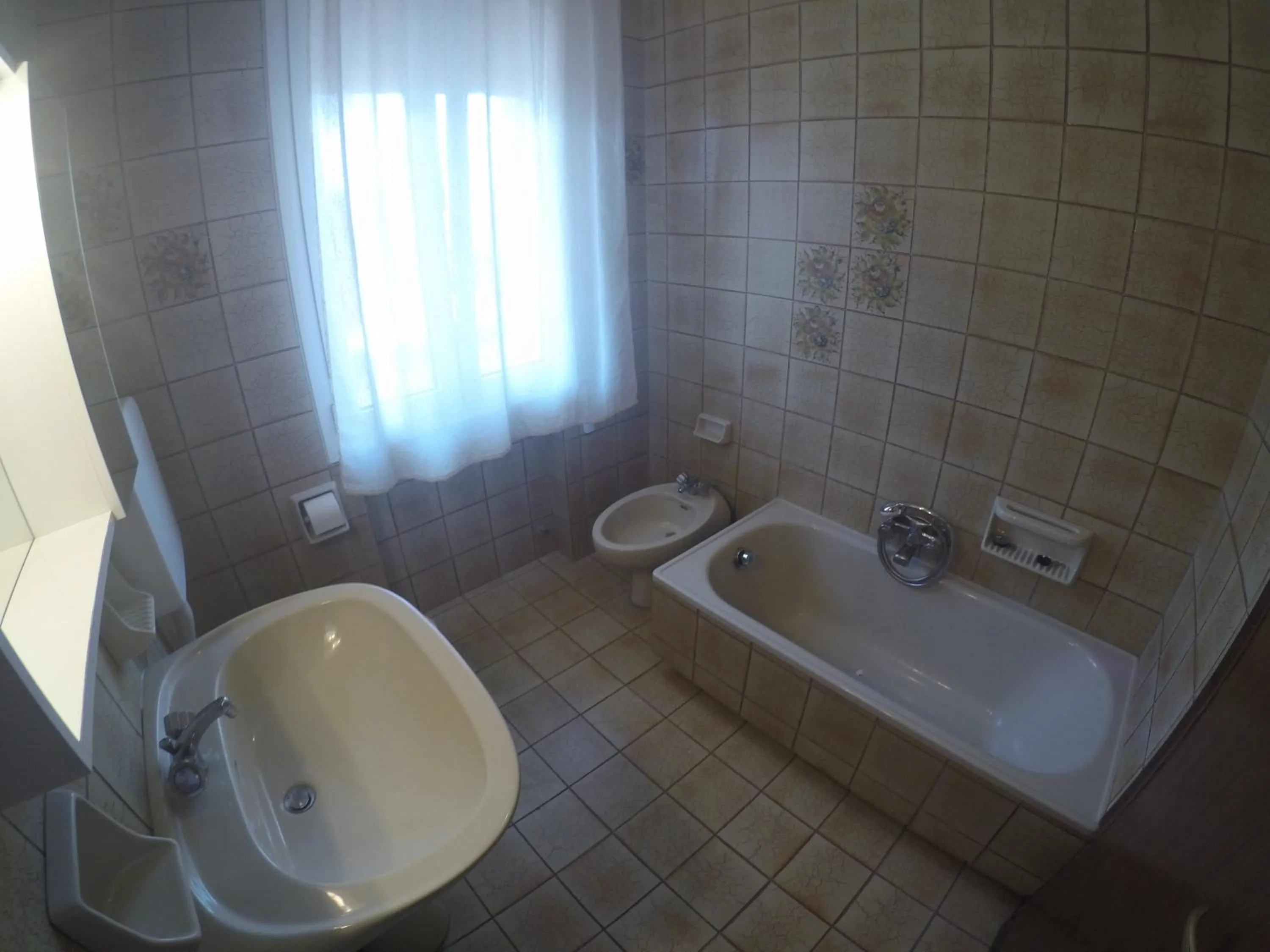 Bathroom in Residence Caorle Apartments - Agenzia Cocal