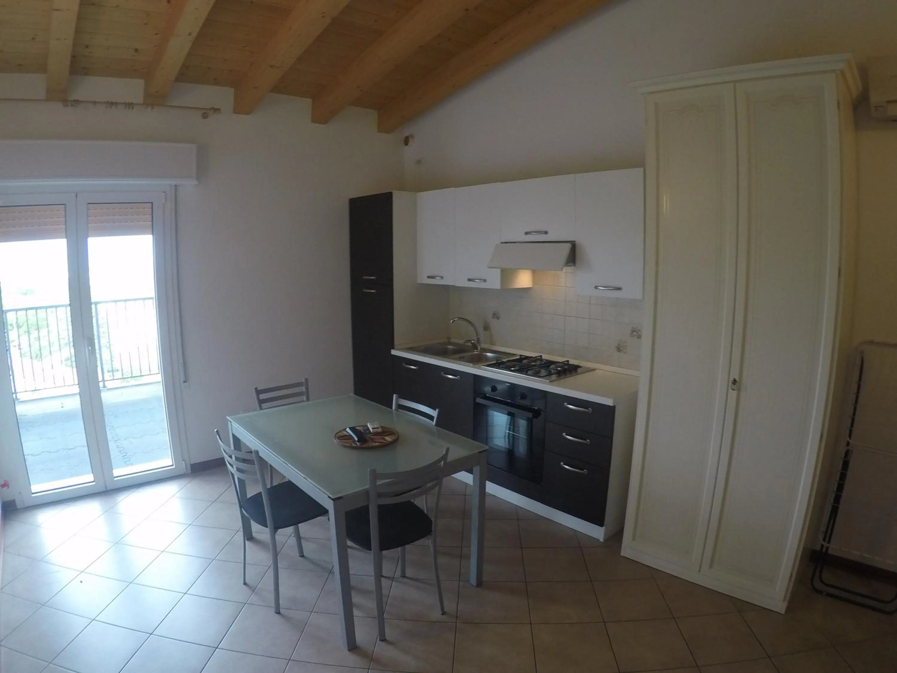 Kitchen or kitchenette in Residence Caorle Apartments - Agenzia Cocal