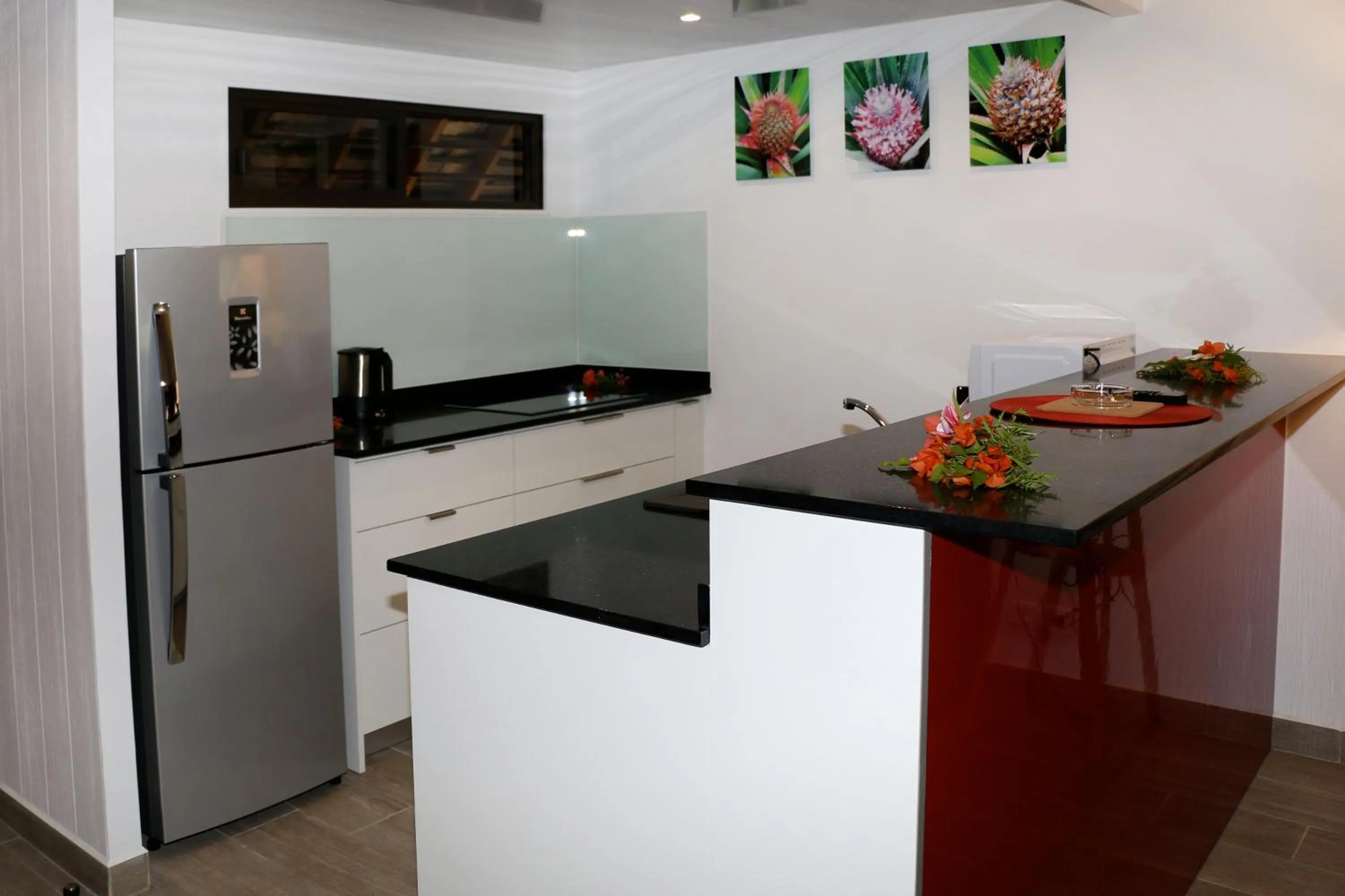 Kitchen or kitchenette in Hotel Hibiscus