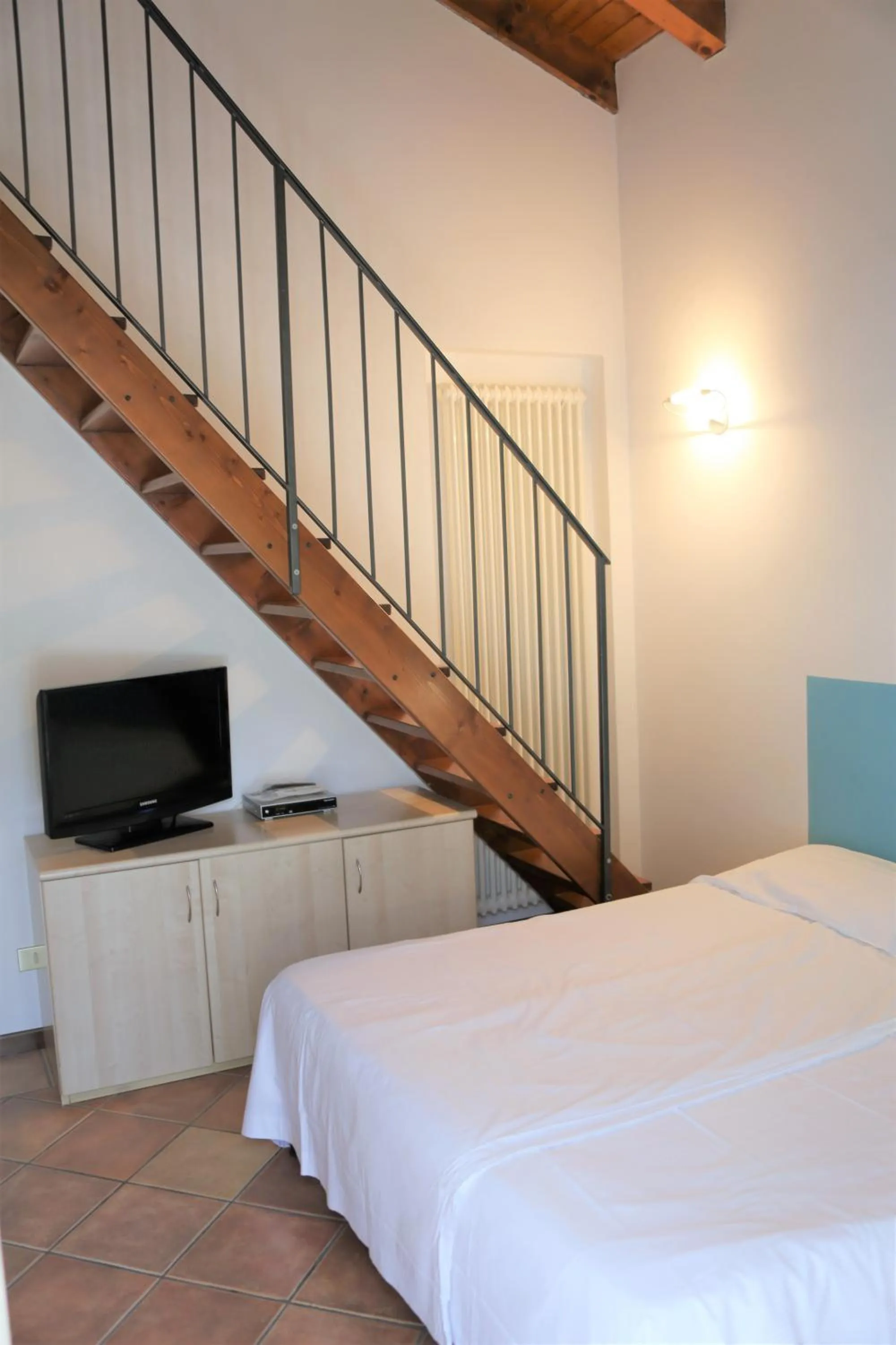 Bedroom, Bed in Appartamenti Ferrari Residence