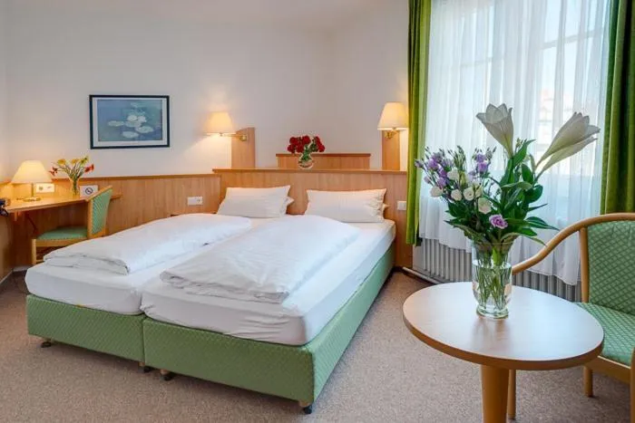 Photo of the whole room, Bed in Hotel Möve garni