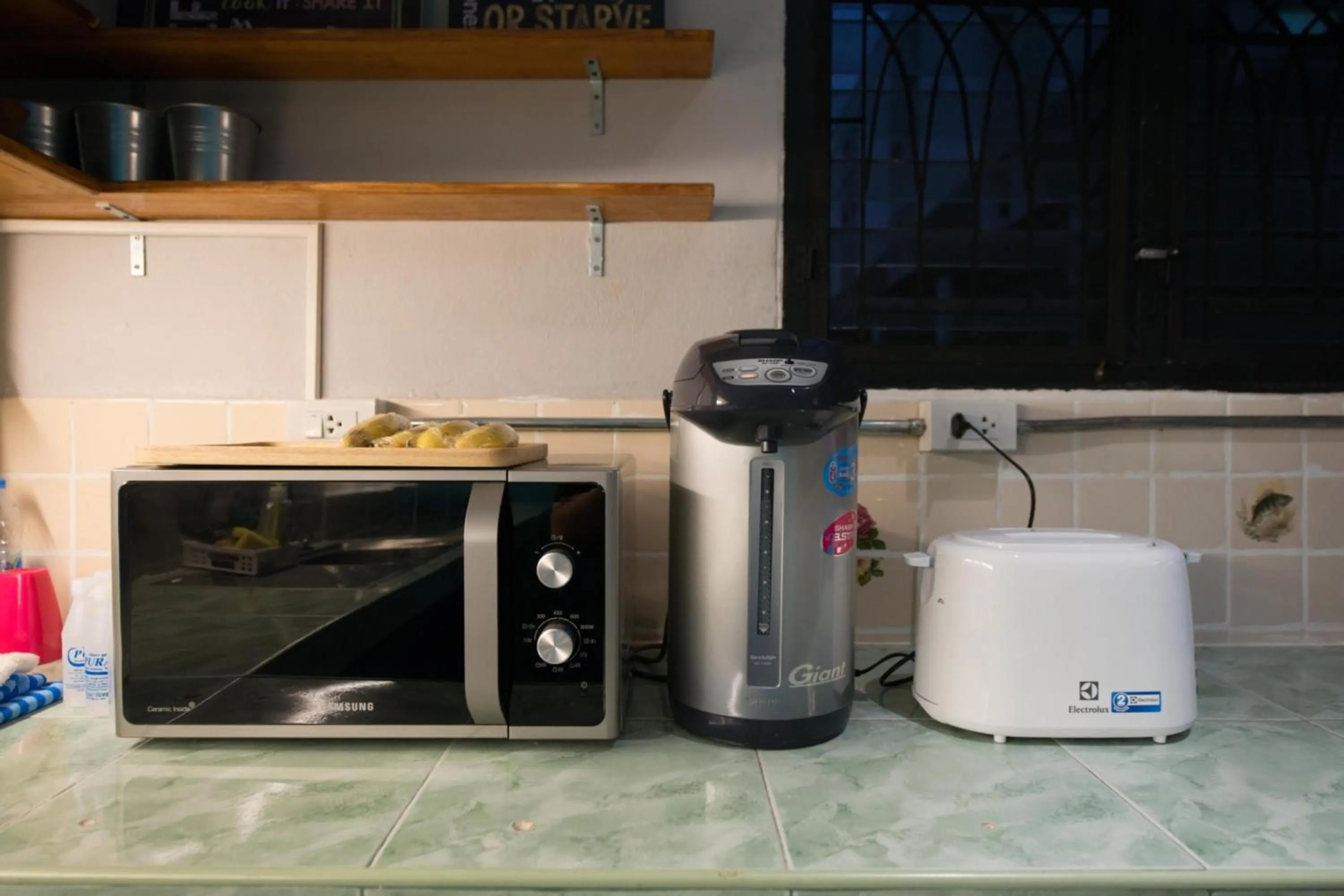 Communal kitchen in 4SHARE Hostel