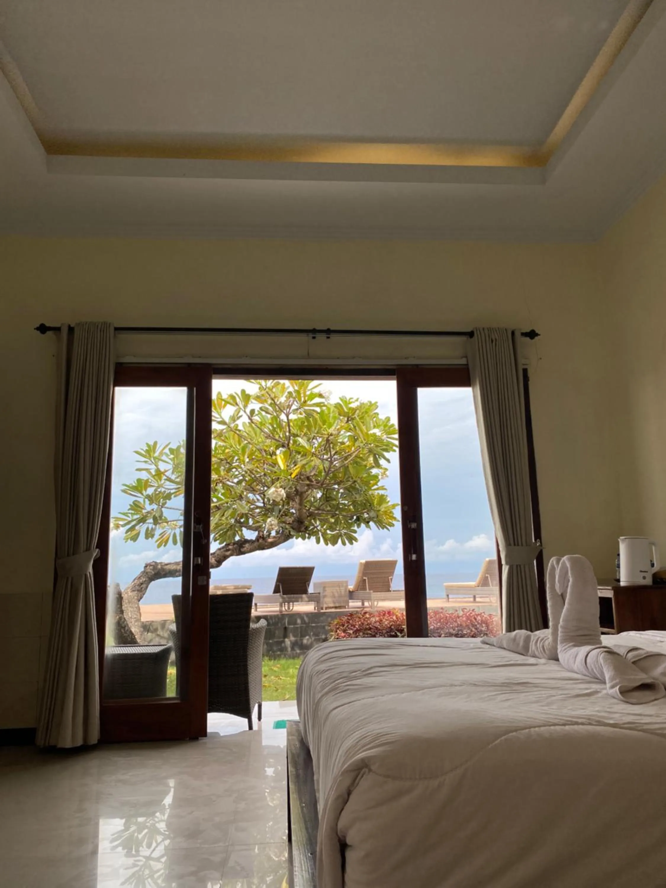 Bed in Cave Beach Bungalow