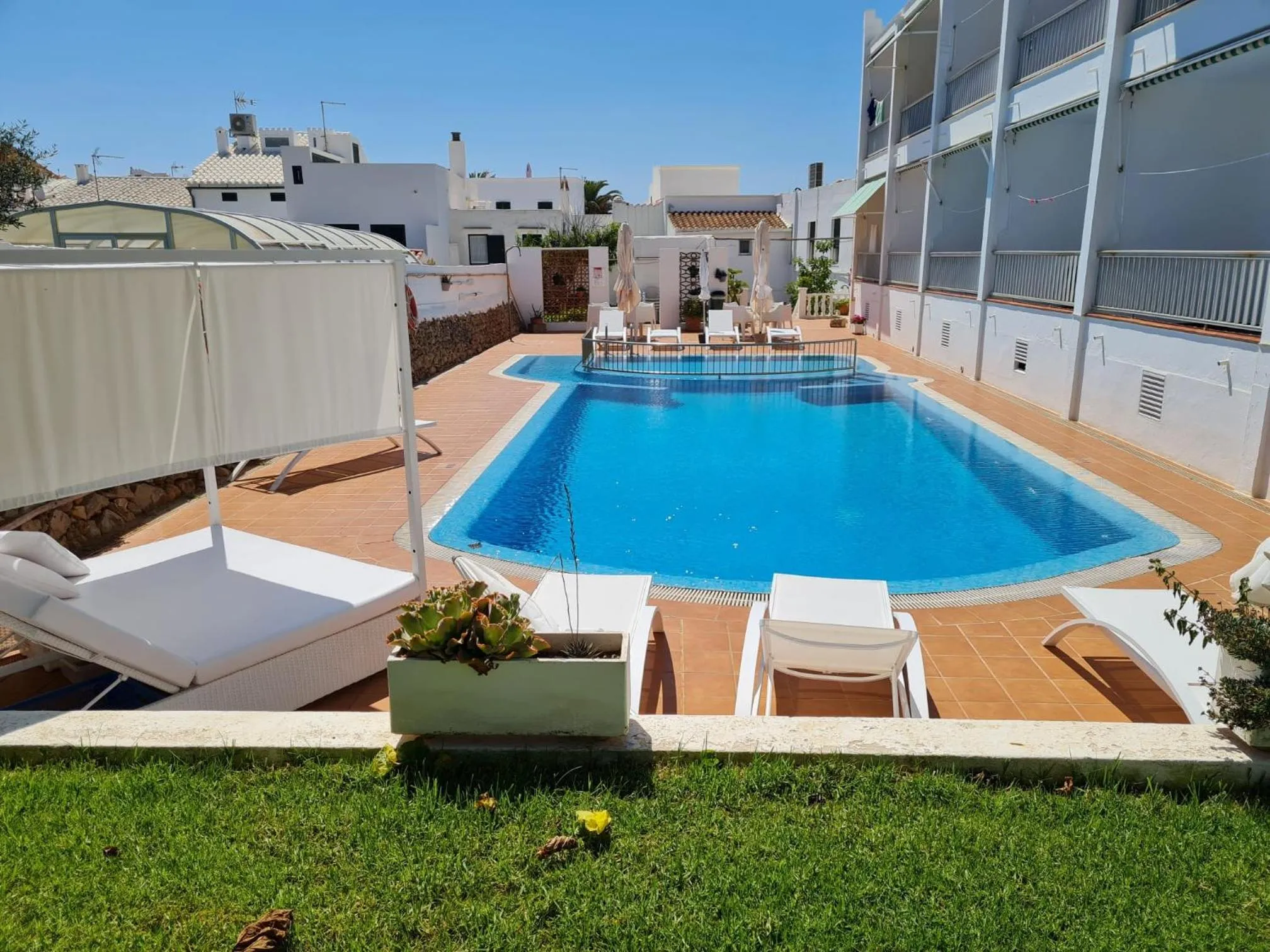Swimming pool in Hostal S'Algaret