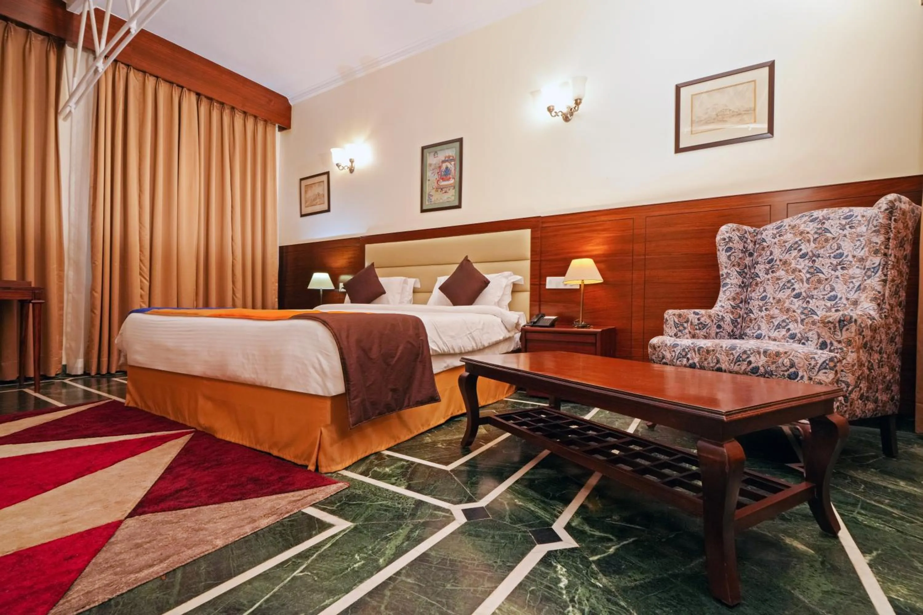 Bed in WelcomHeritage Taragarh Palace