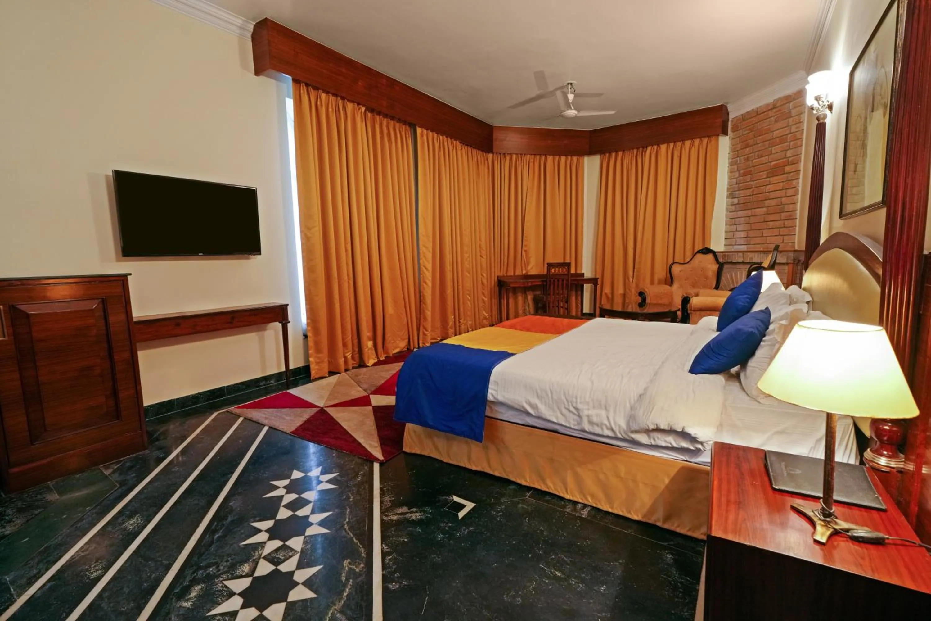 Bed in WelcomHeritage Taragarh Palace