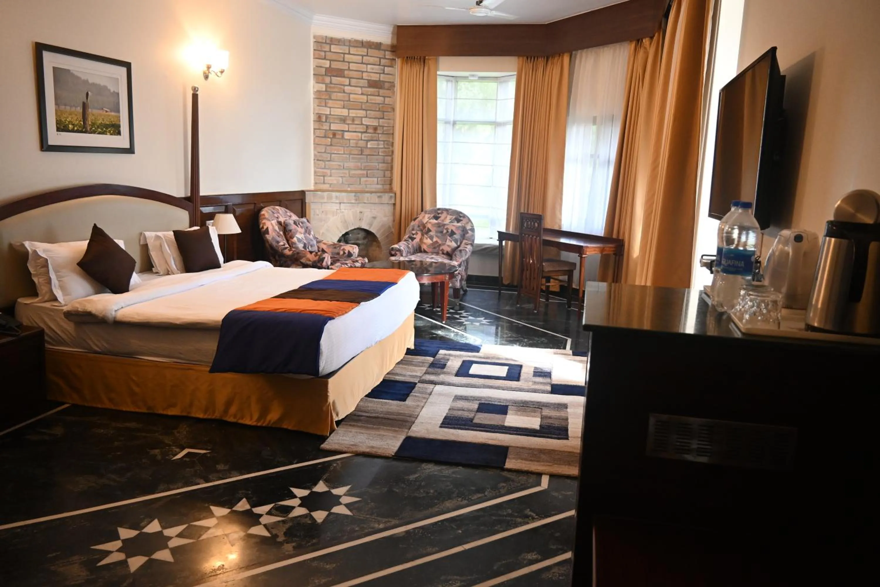 Bed in WelcomHeritage Taragarh Palace