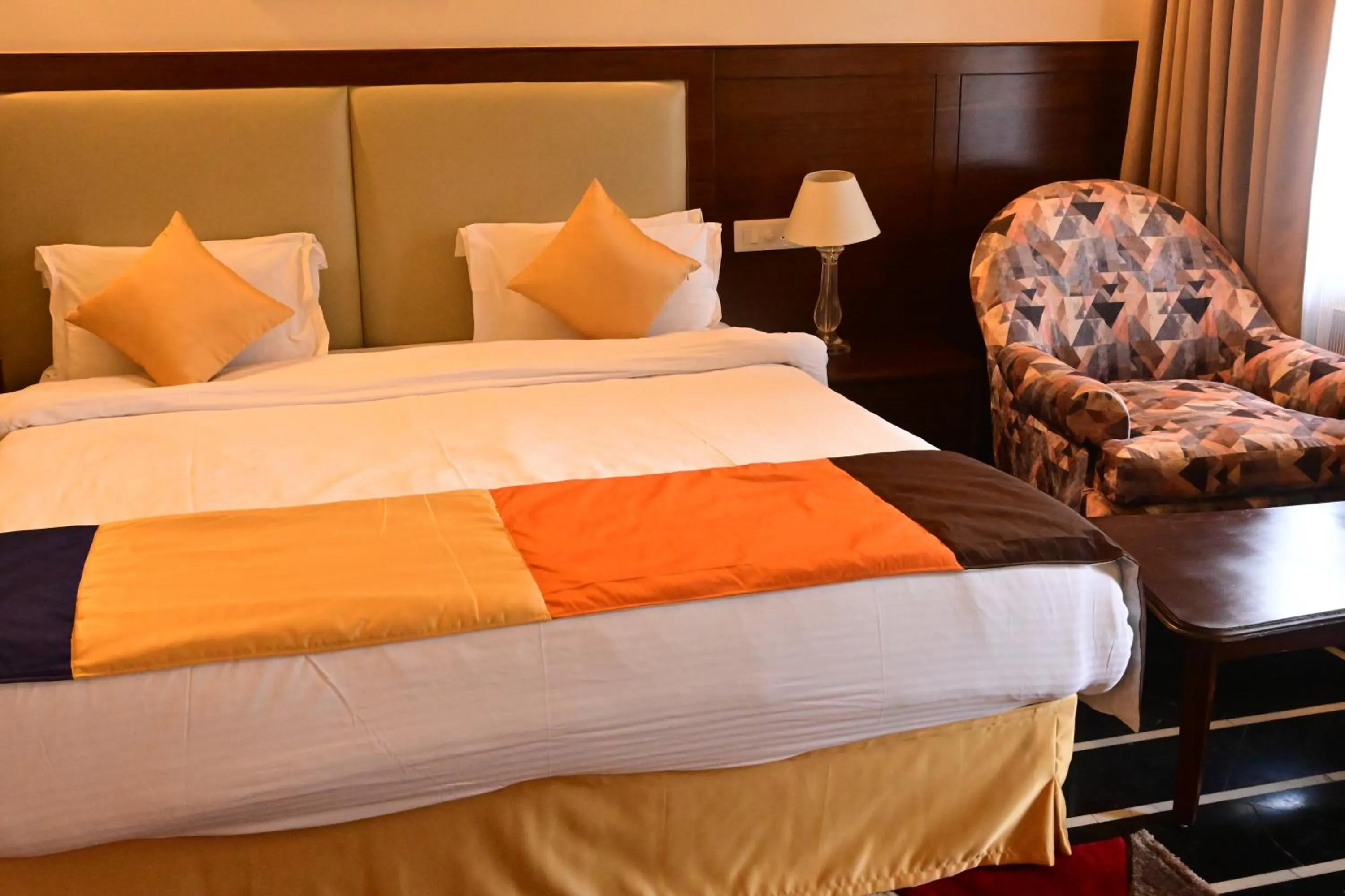 Bed in WelcomHeritage Taragarh Palace