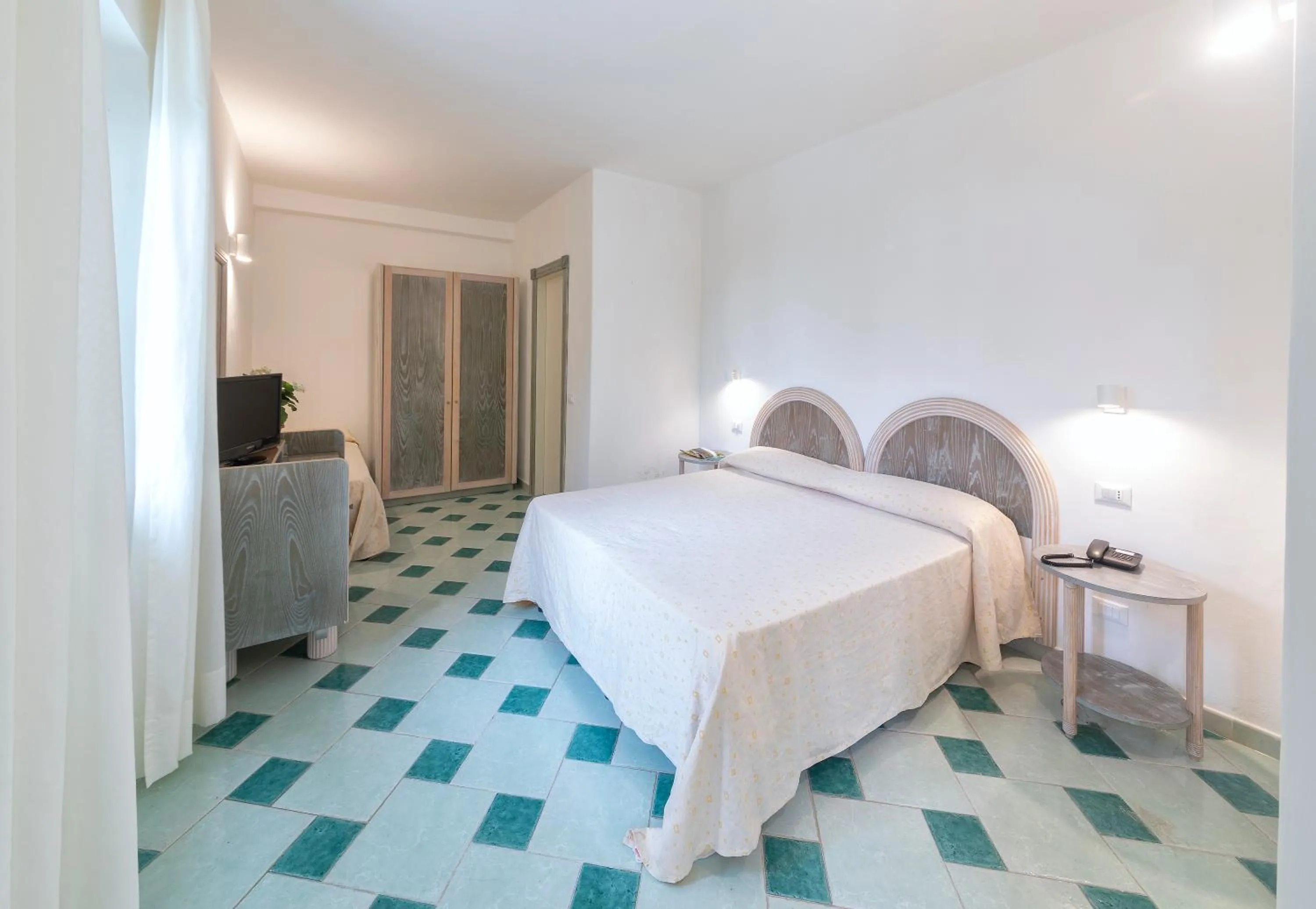 Bed in Hotel Oasi Castiglione