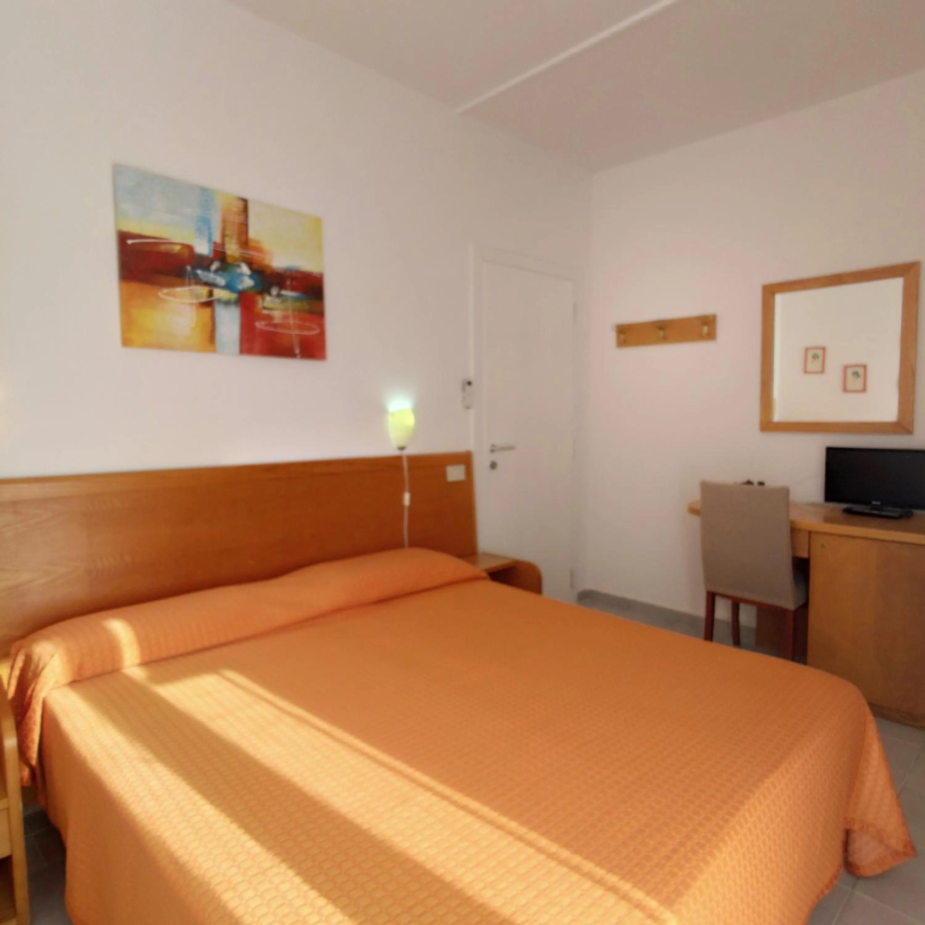 Bed in Piccolo Hotel