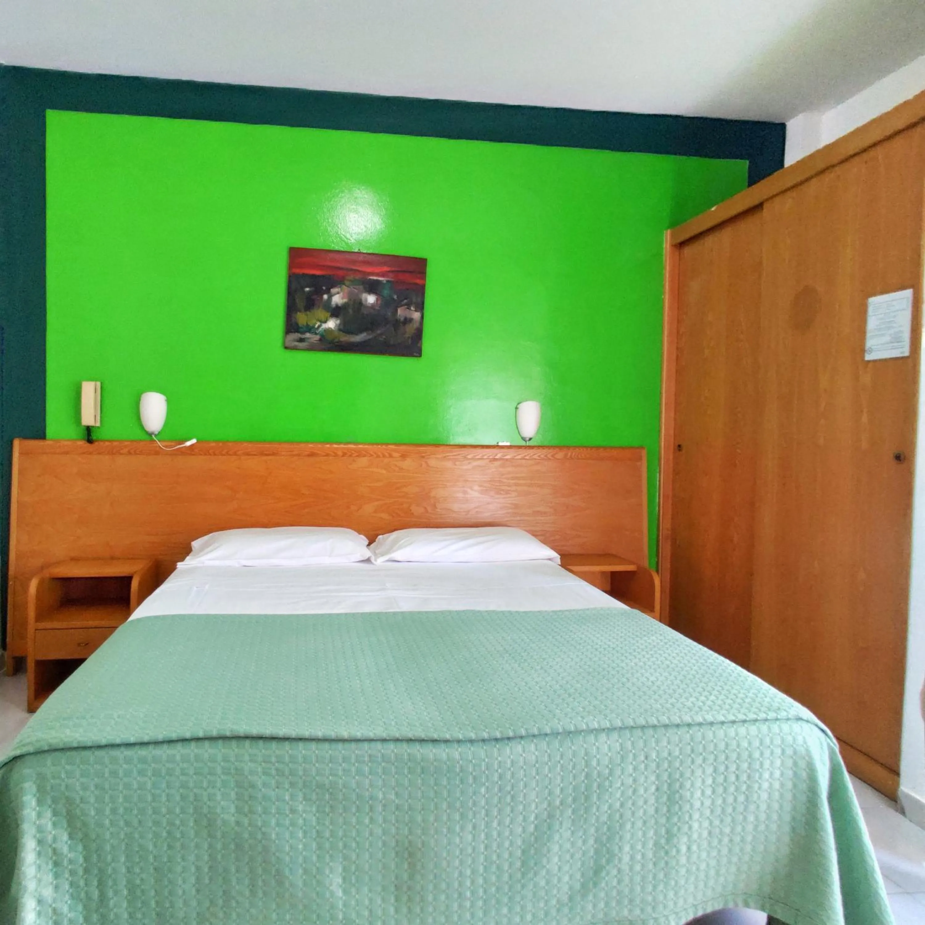 Bed in Piccolo Hotel