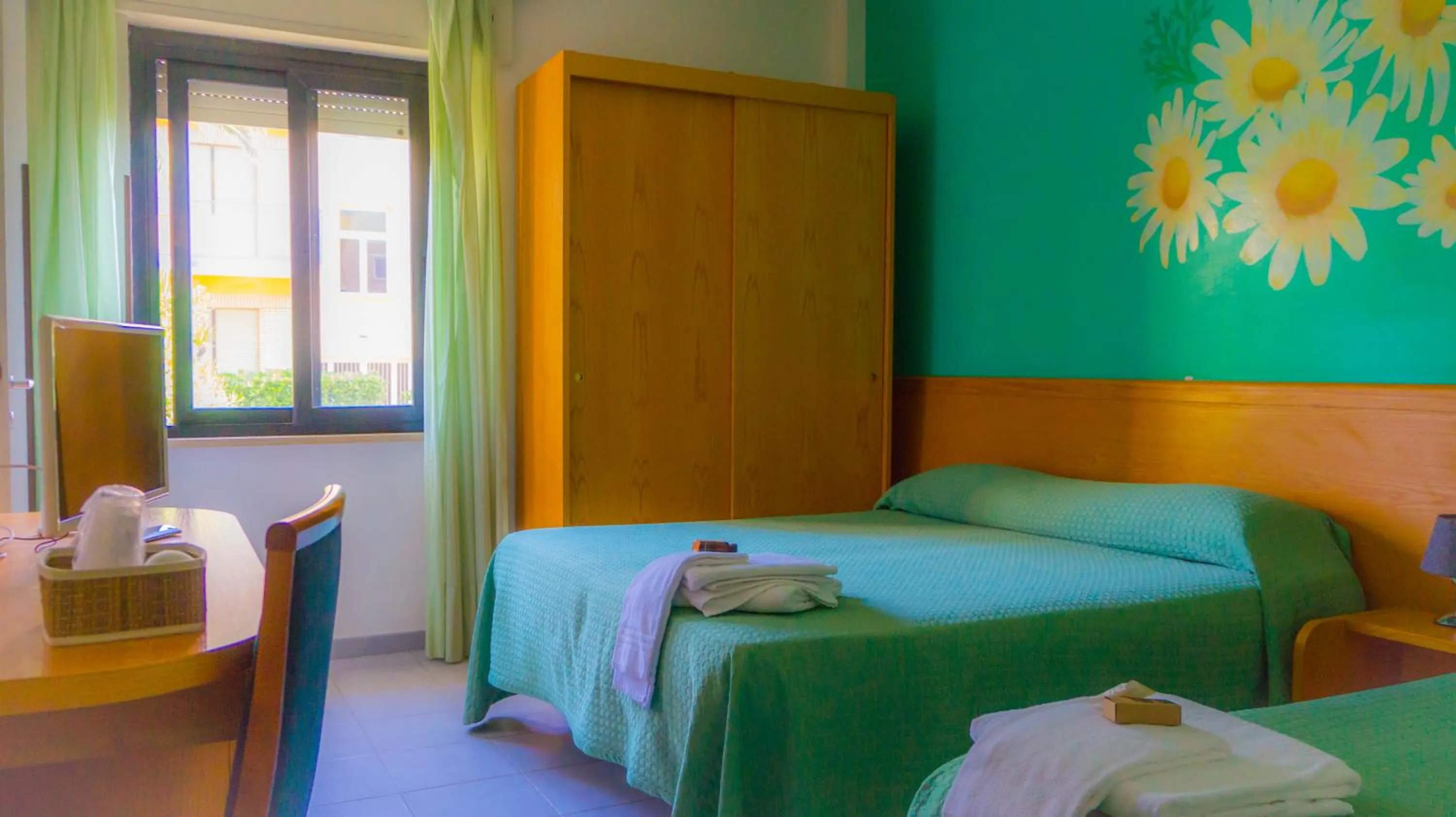 Bedroom in Piccolo Hotel