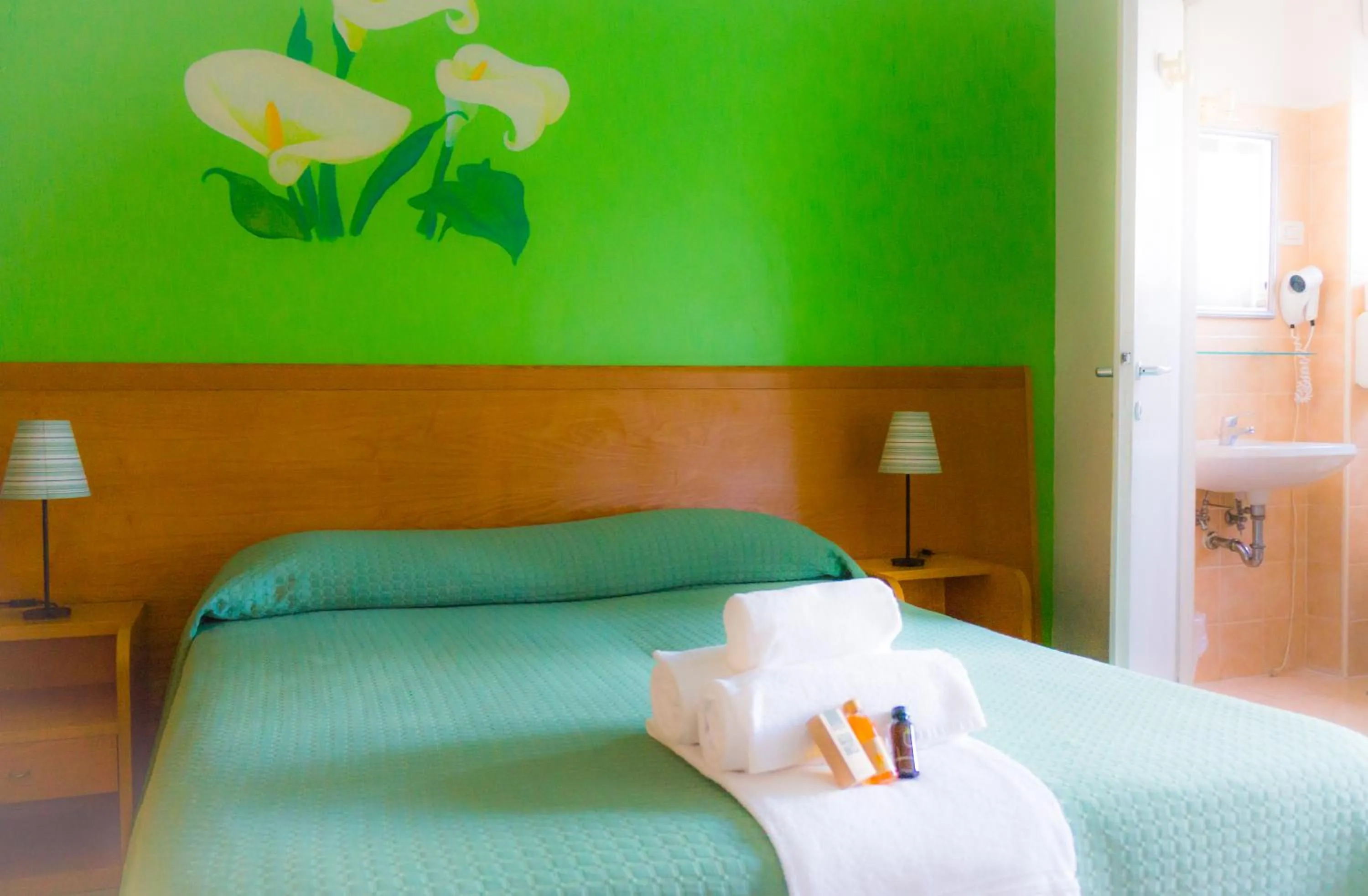 Bed in Piccolo Hotel