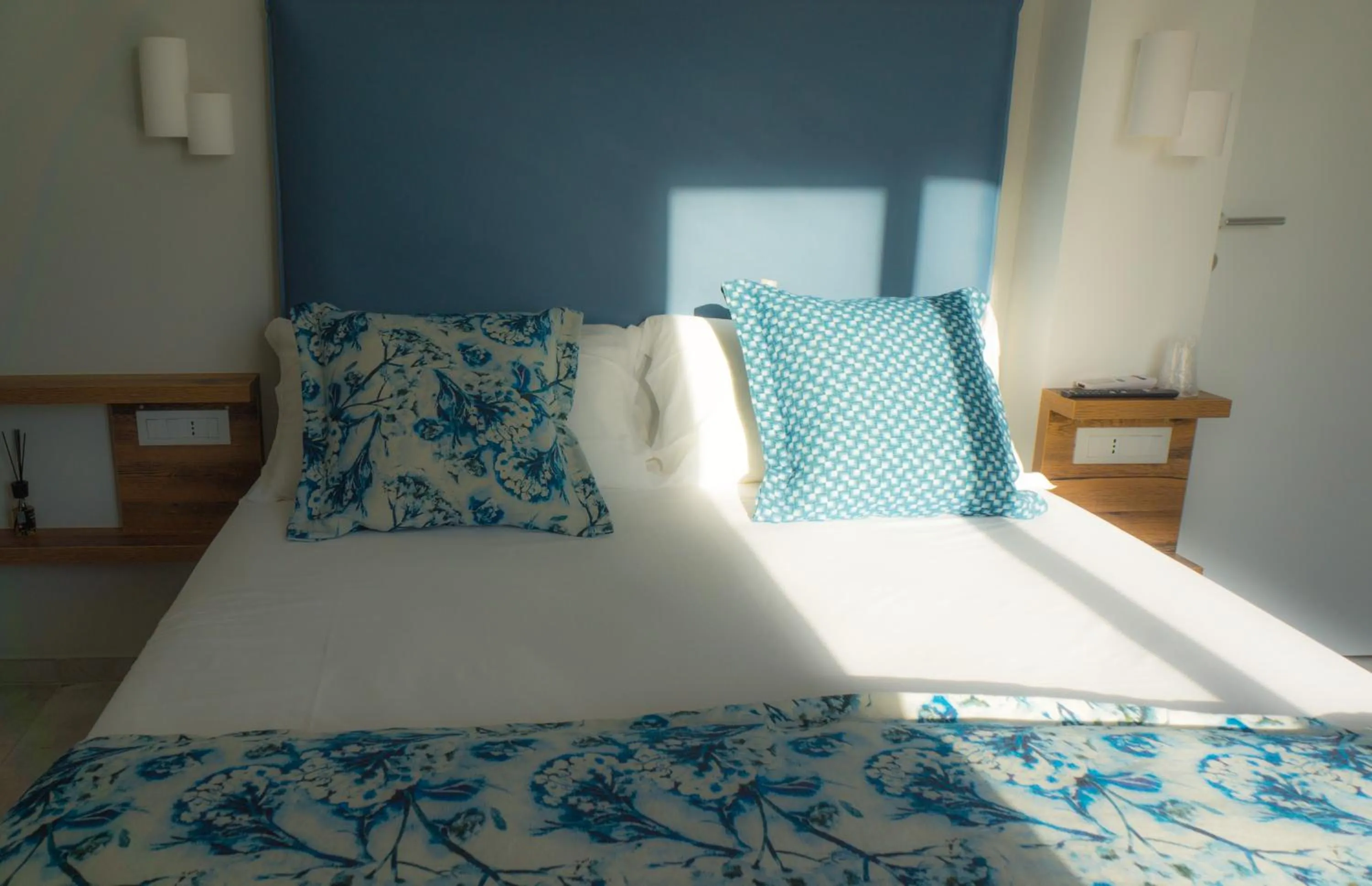 Bed in Piccolo Hotel