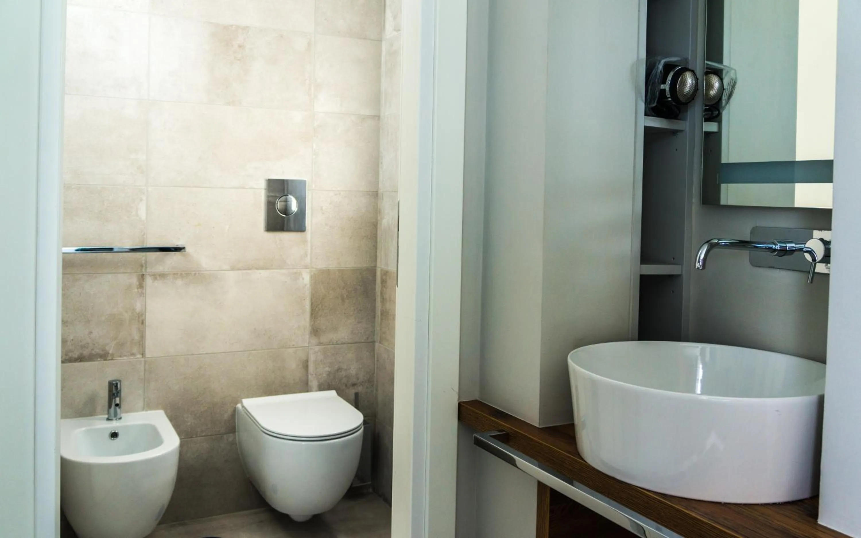 Toilet in Piccolo Hotel