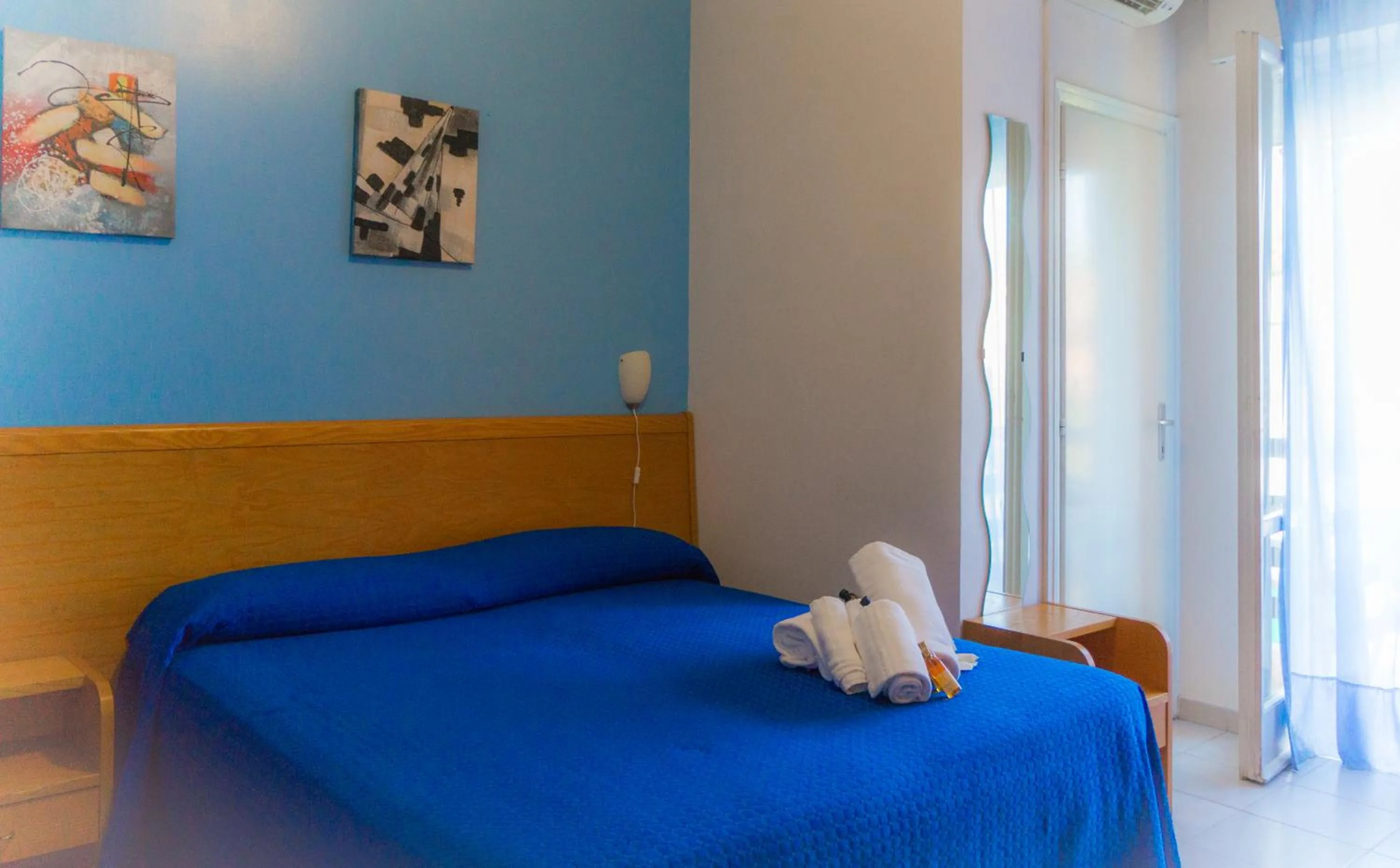 Bedroom in Piccolo Hotel