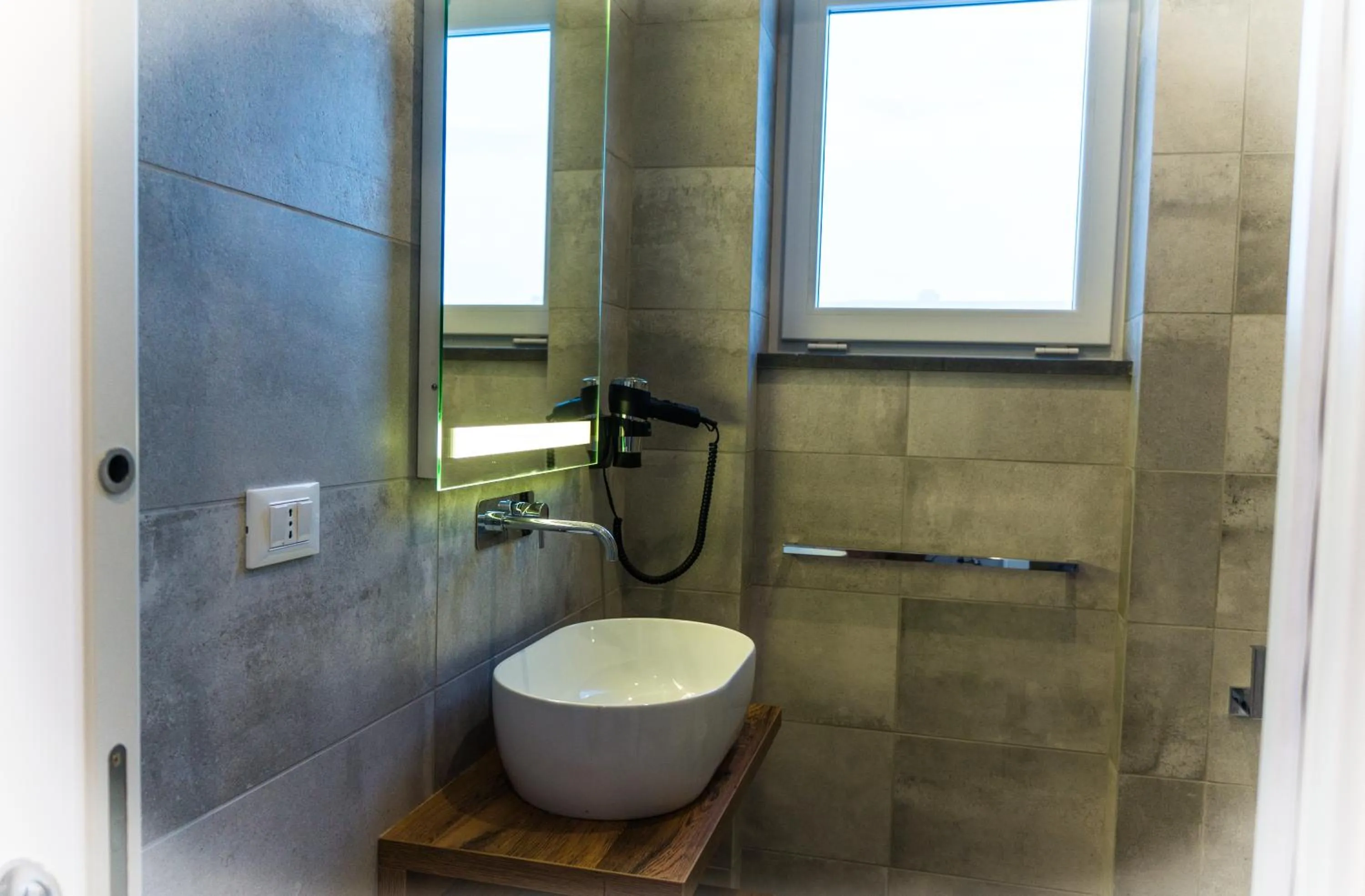 Bathroom in Piccolo Hotel