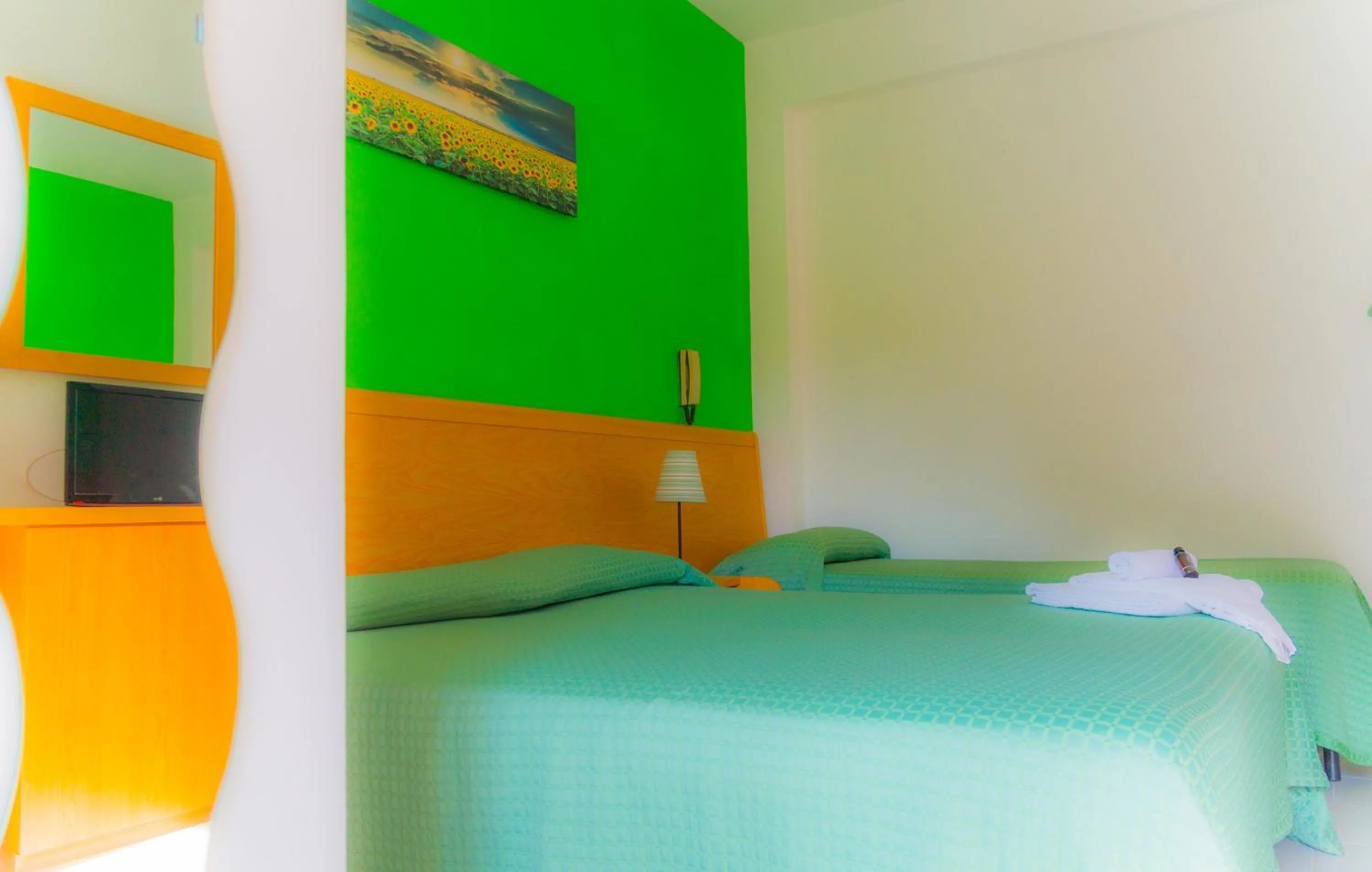 Bed in Piccolo Hotel