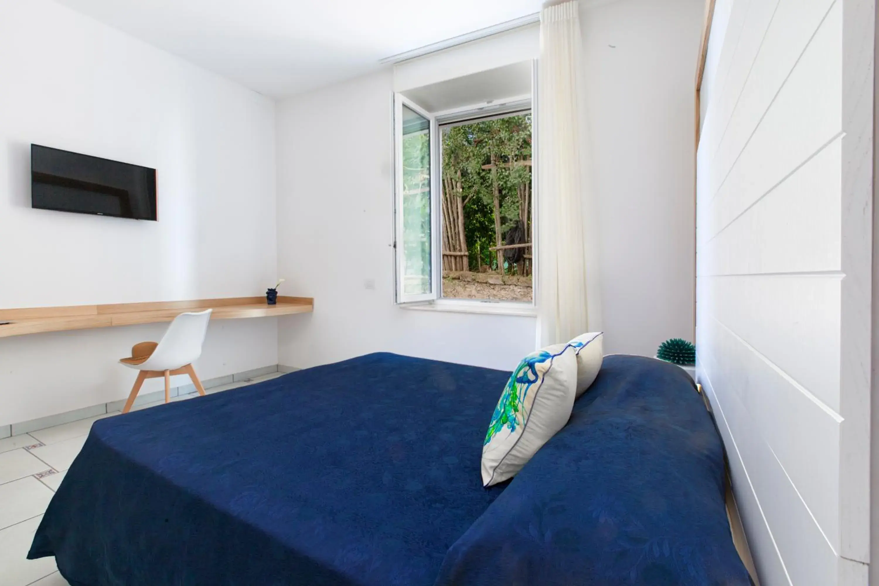 Bed in Hotel Piccolo Paradiso Bed in Hotel Piccolo Paradiso