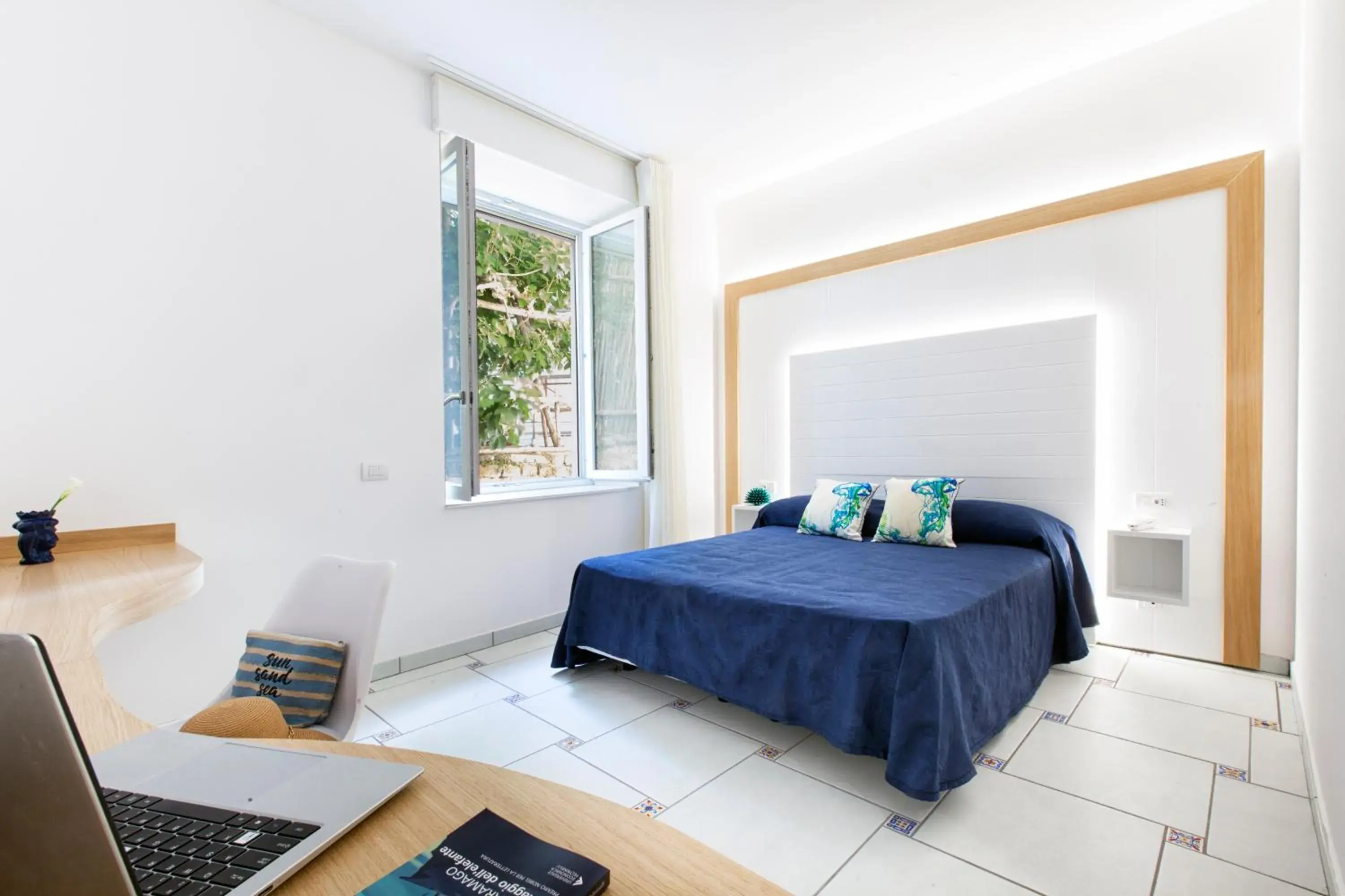 Bed in Hotel Piccolo Paradiso Bed in Hotel Piccolo Paradiso