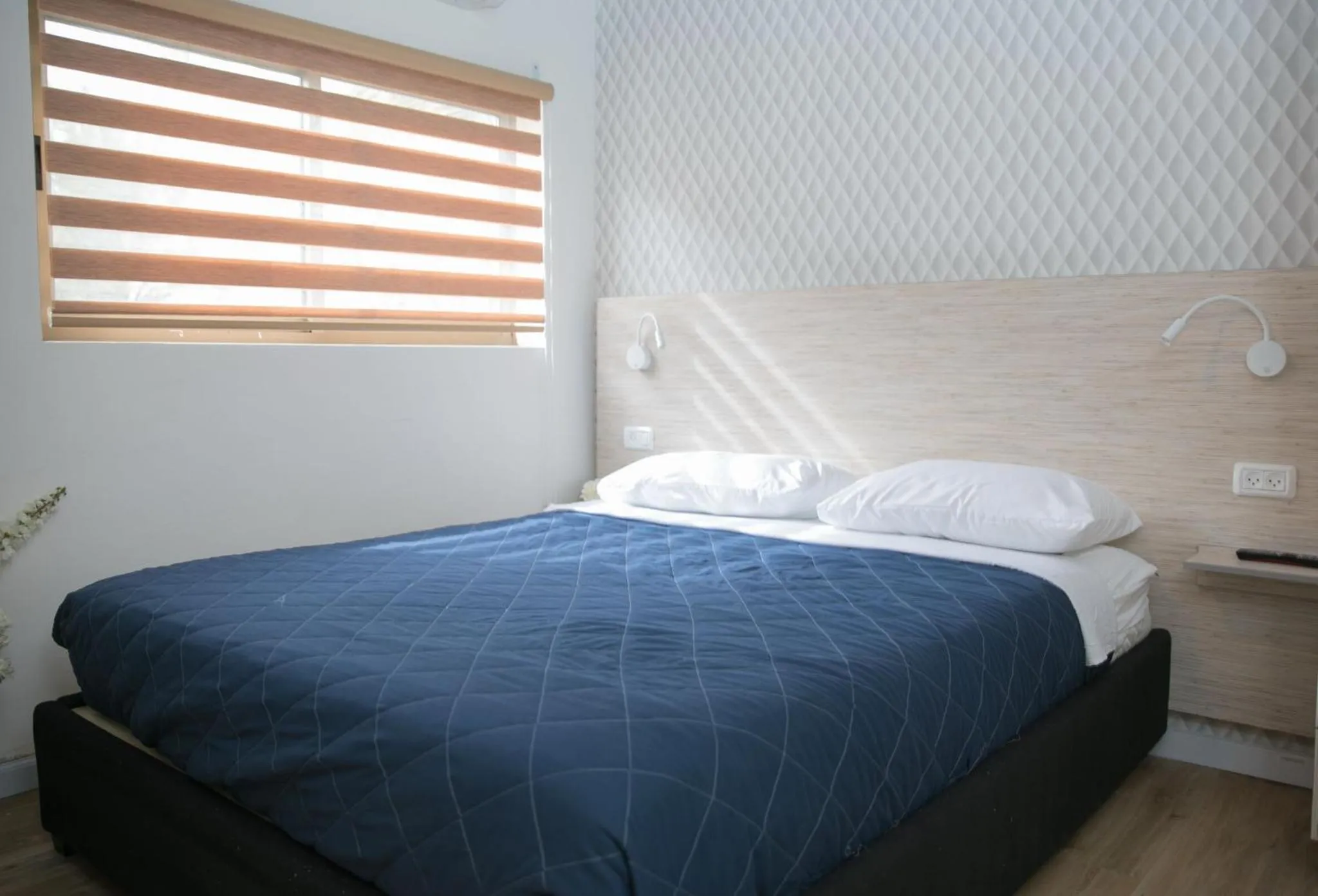 Bed in Rich Boutique Hotel