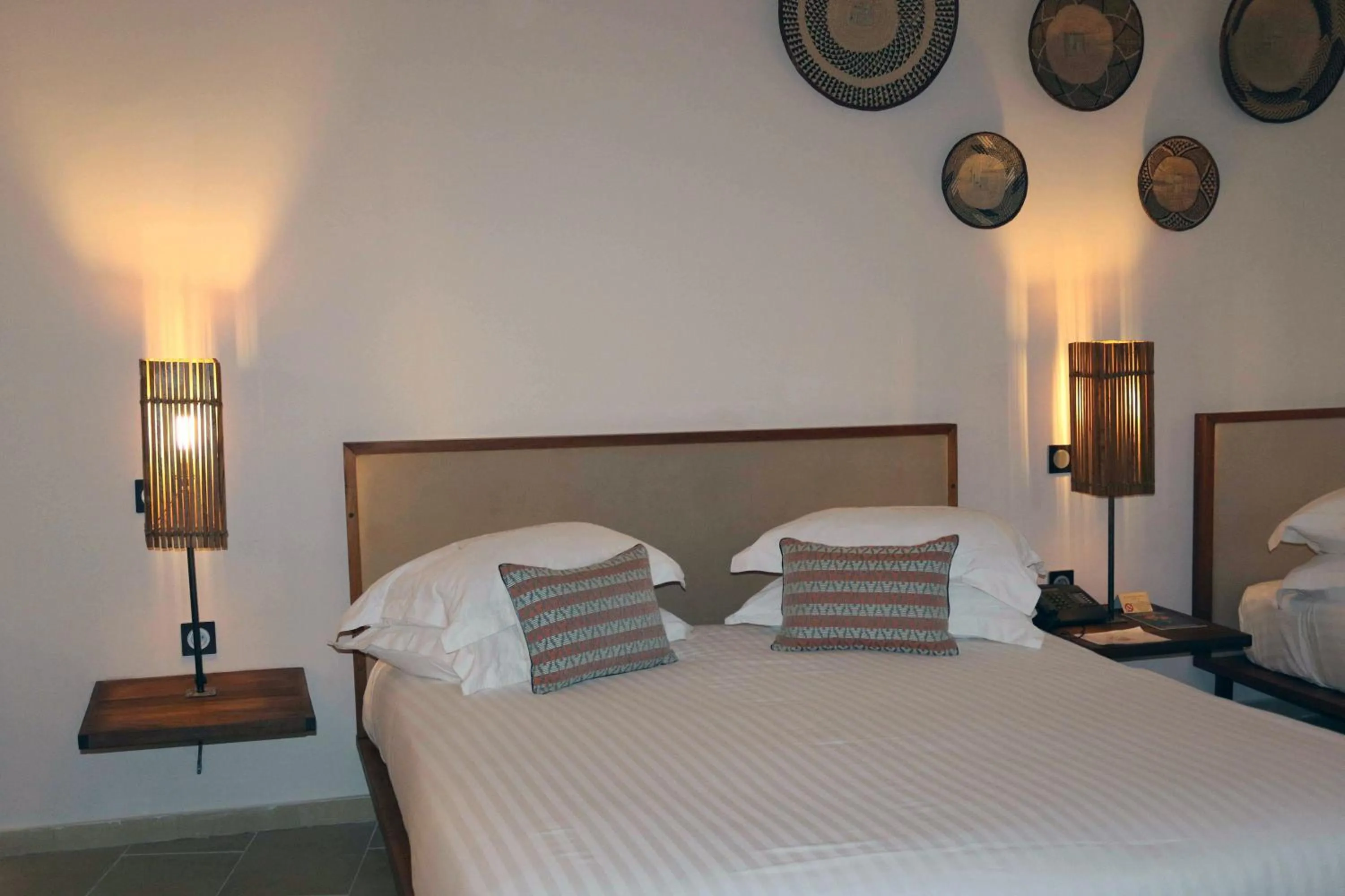 Photo of the whole room, Bed in Movenpick Resort Lamantin Saly