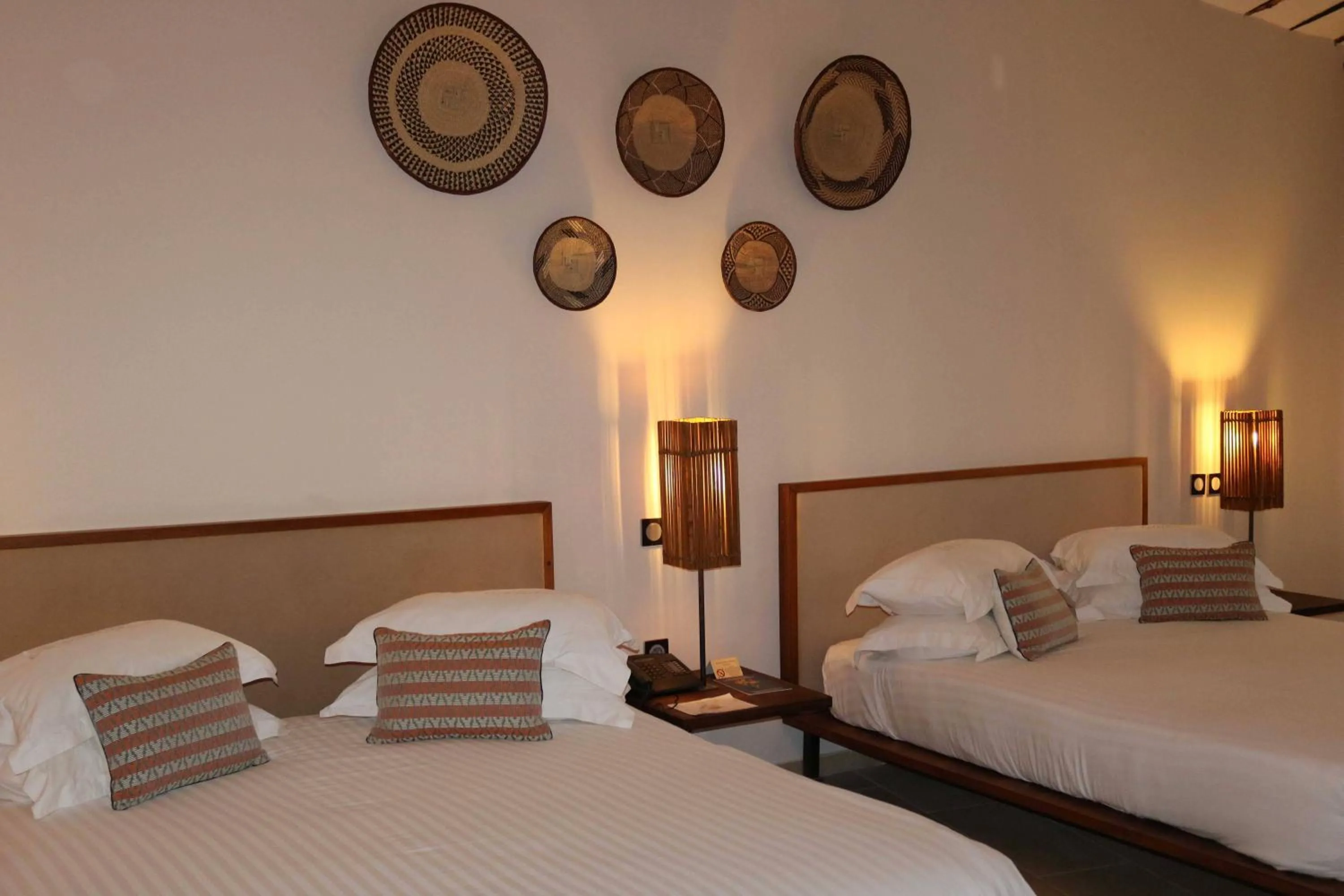 Photo of the whole room, Bed in Movenpick Resort Lamantin Saly