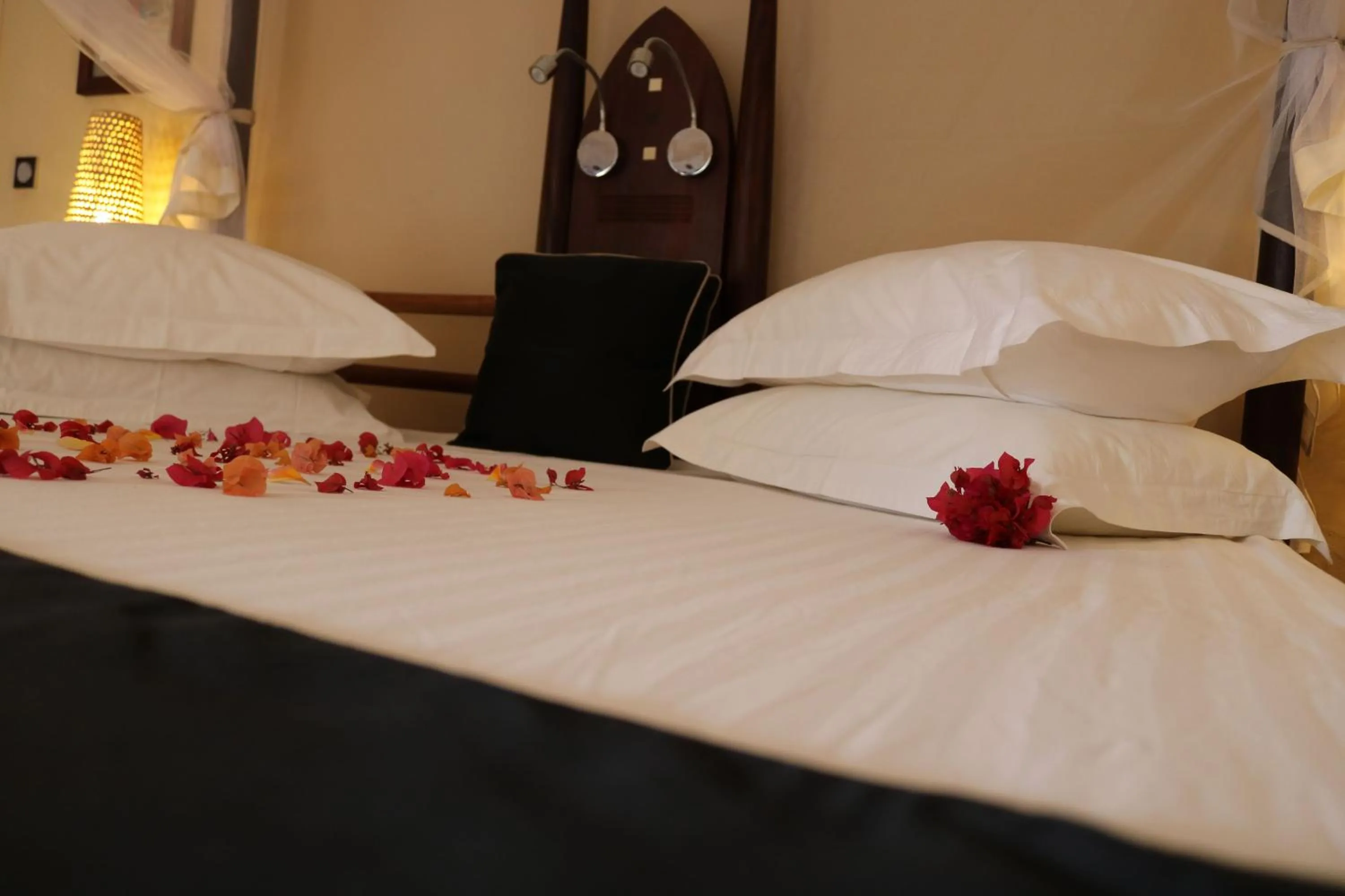 Photo of the whole room, Bed in Movenpick Resort Lamantin Saly