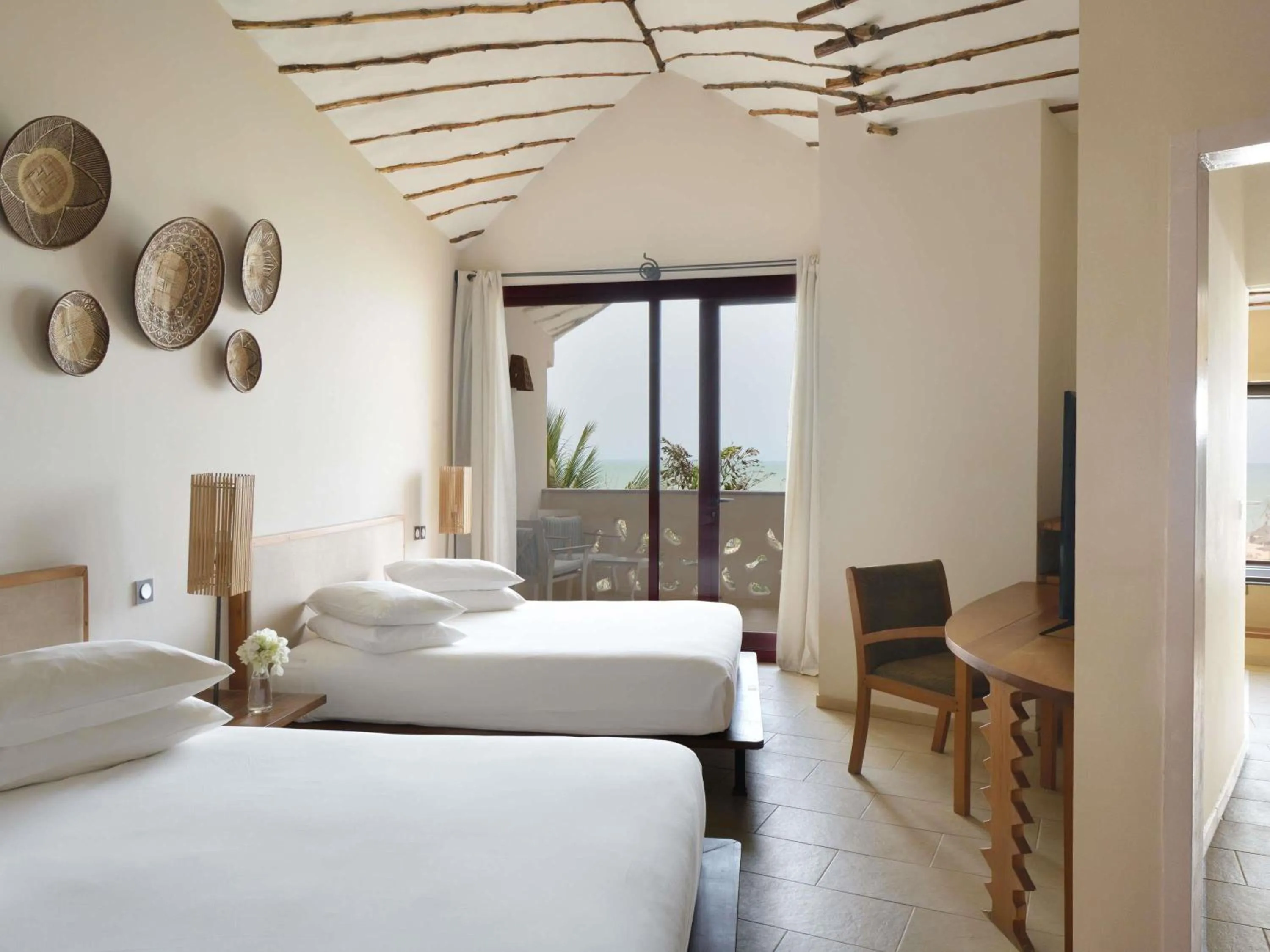 Bedroom, Bed in Movenpick Resort Lamantin Saly