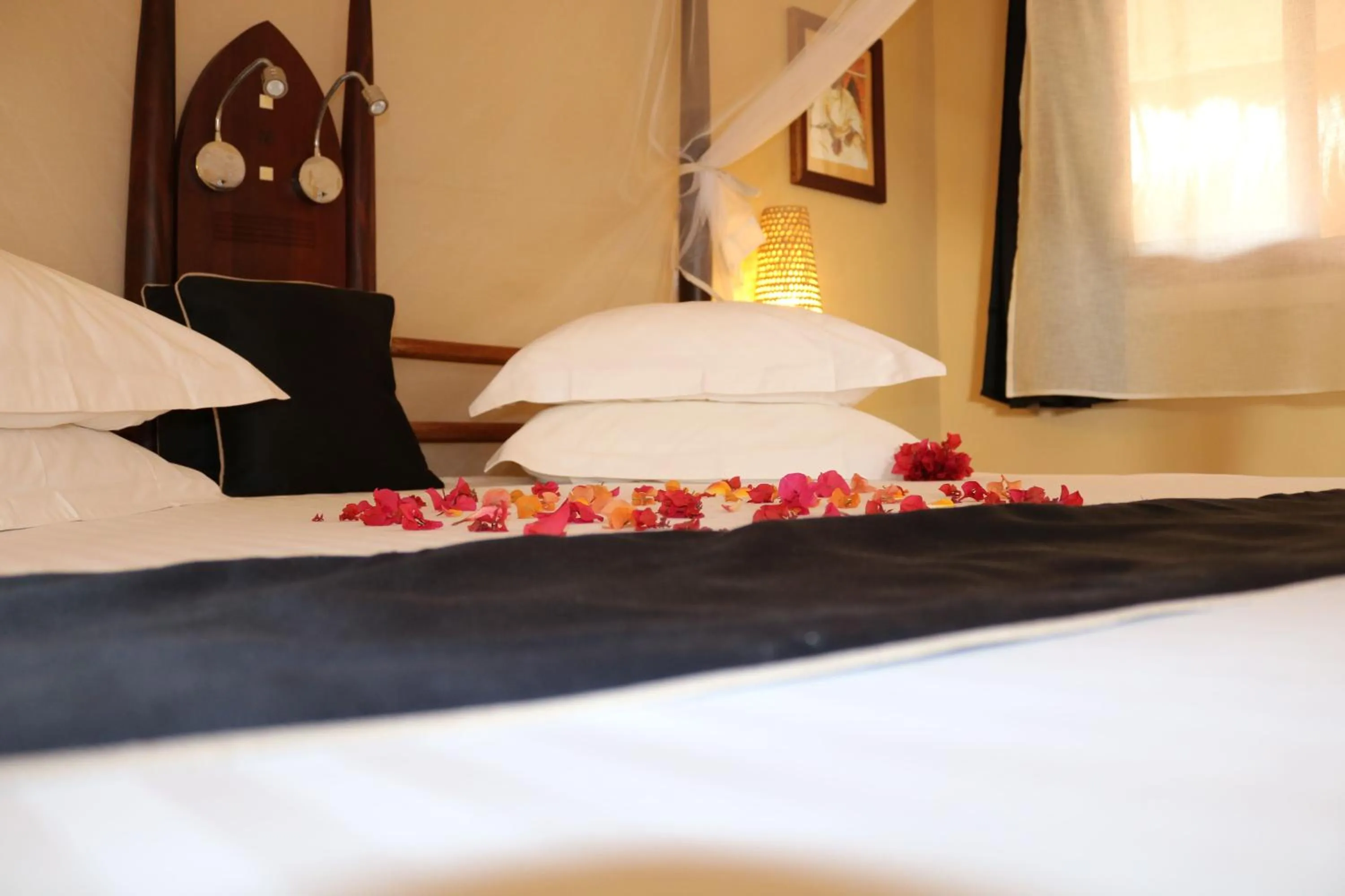 Photo of the whole room, Bed in Movenpick Resort Lamantin Saly