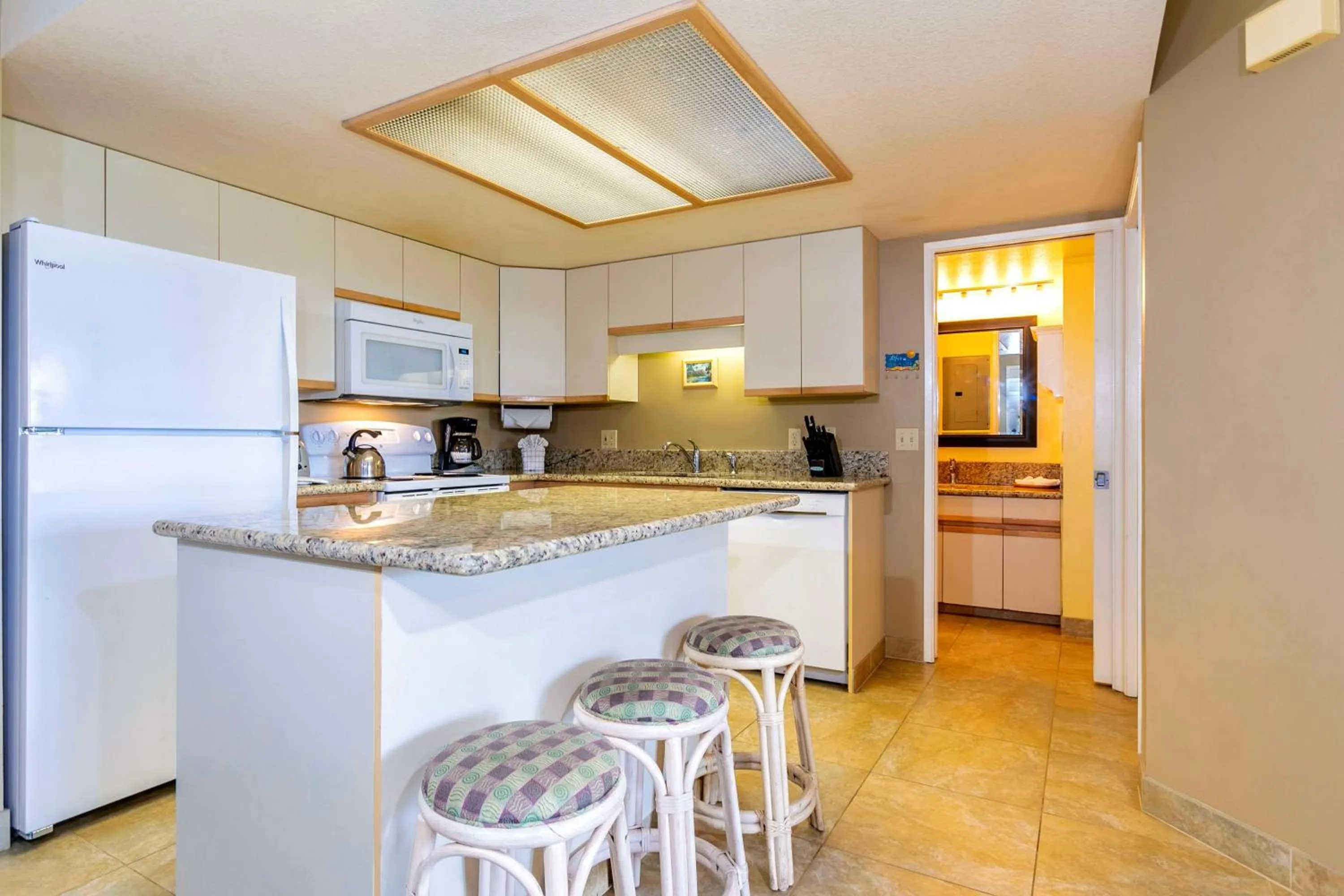 Kitchen or kitchenette in Aston at the Maui Banyan