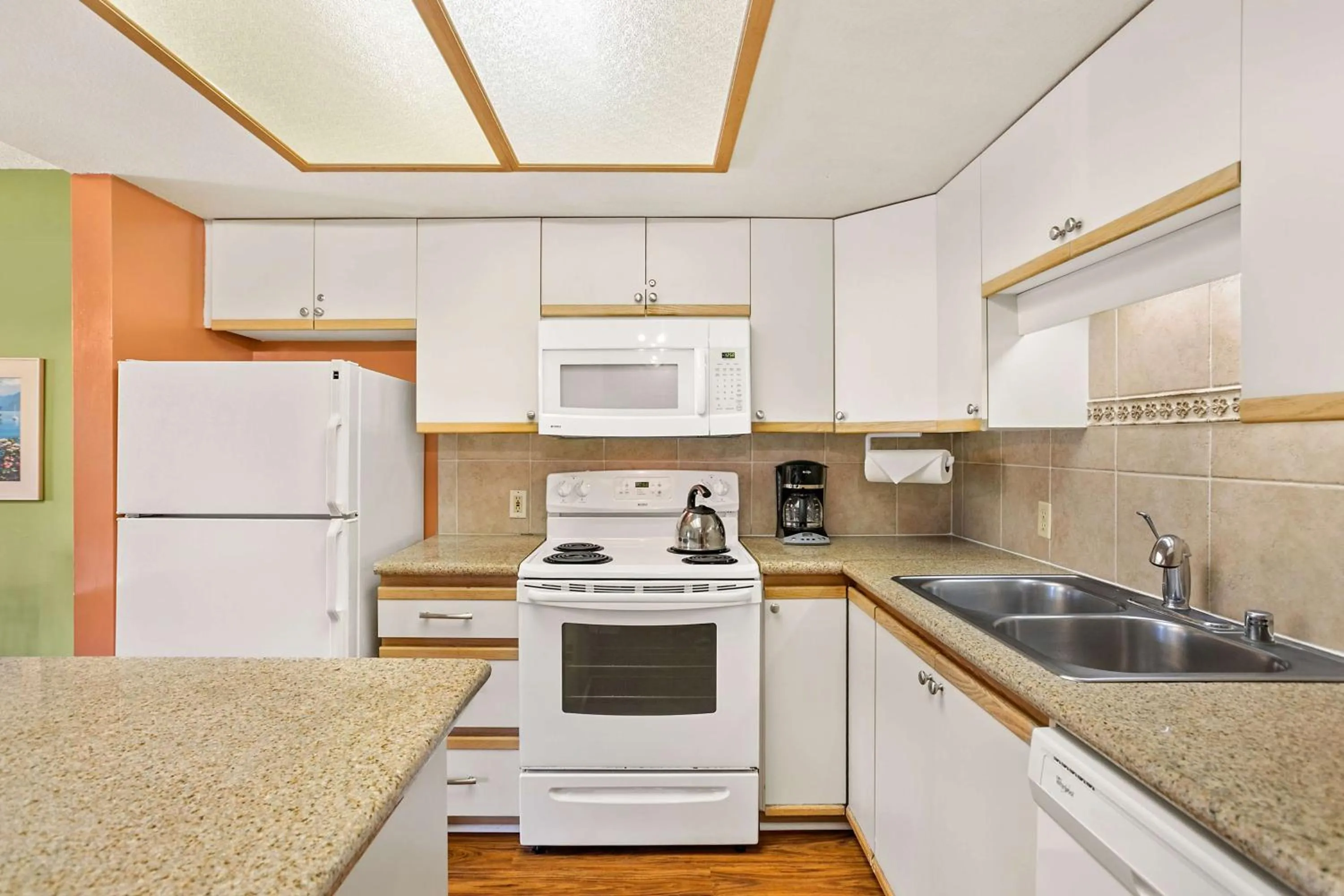 Kitchen or kitchenette in Aston at the Maui Banyan