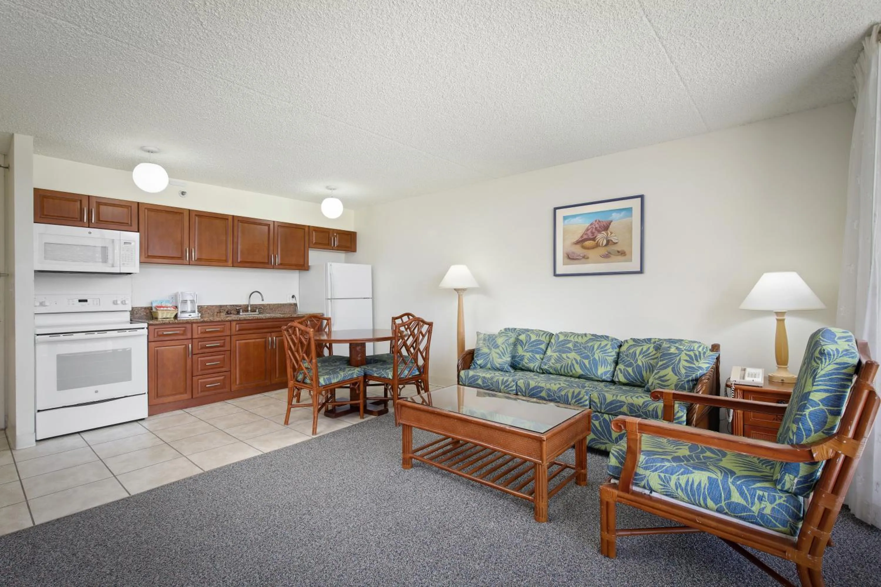 Kitchen or kitchenette in Aston at the Waikiki Banyan