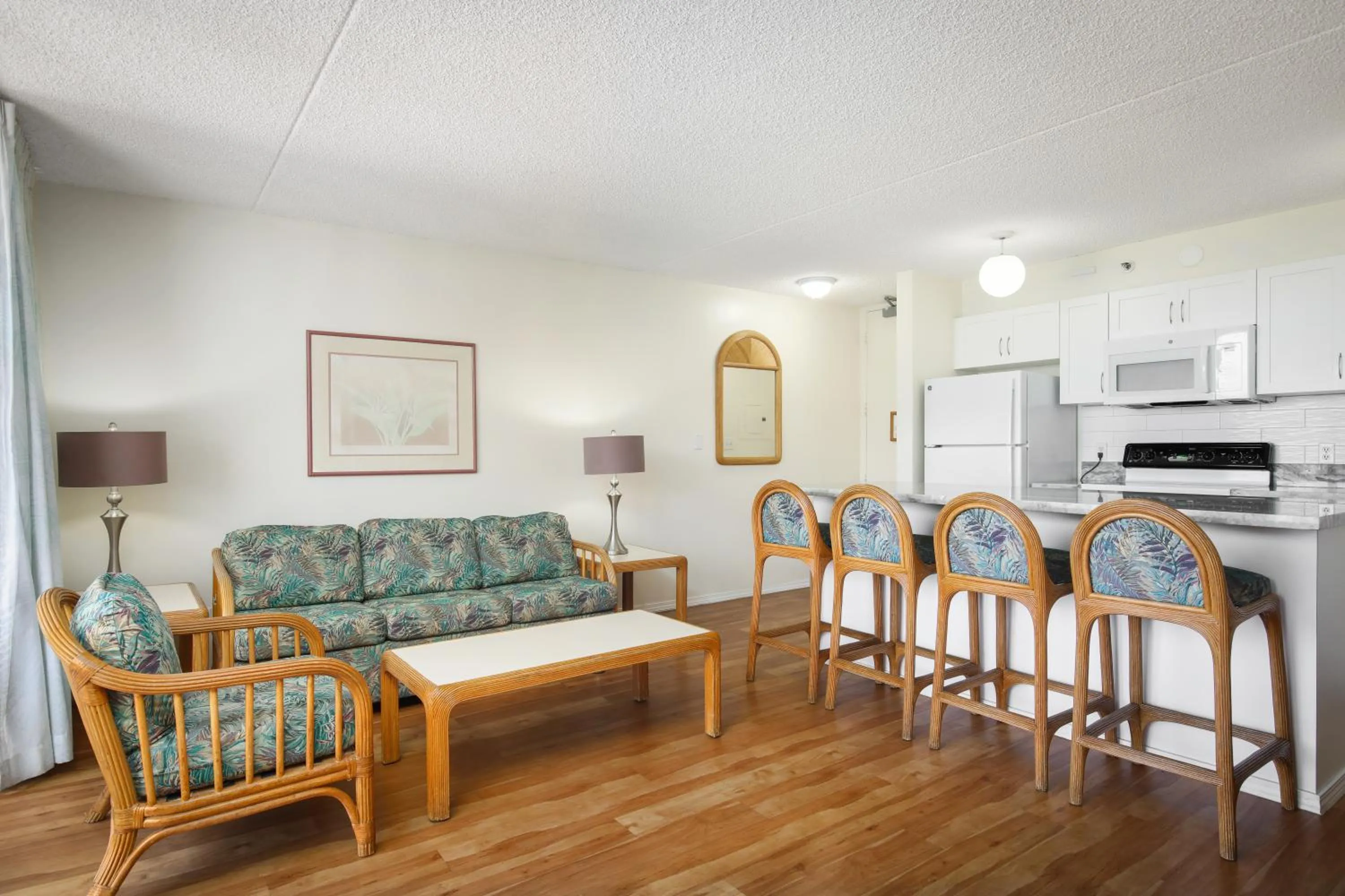 Kitchen or kitchenette in Aston at the Waikiki Banyan