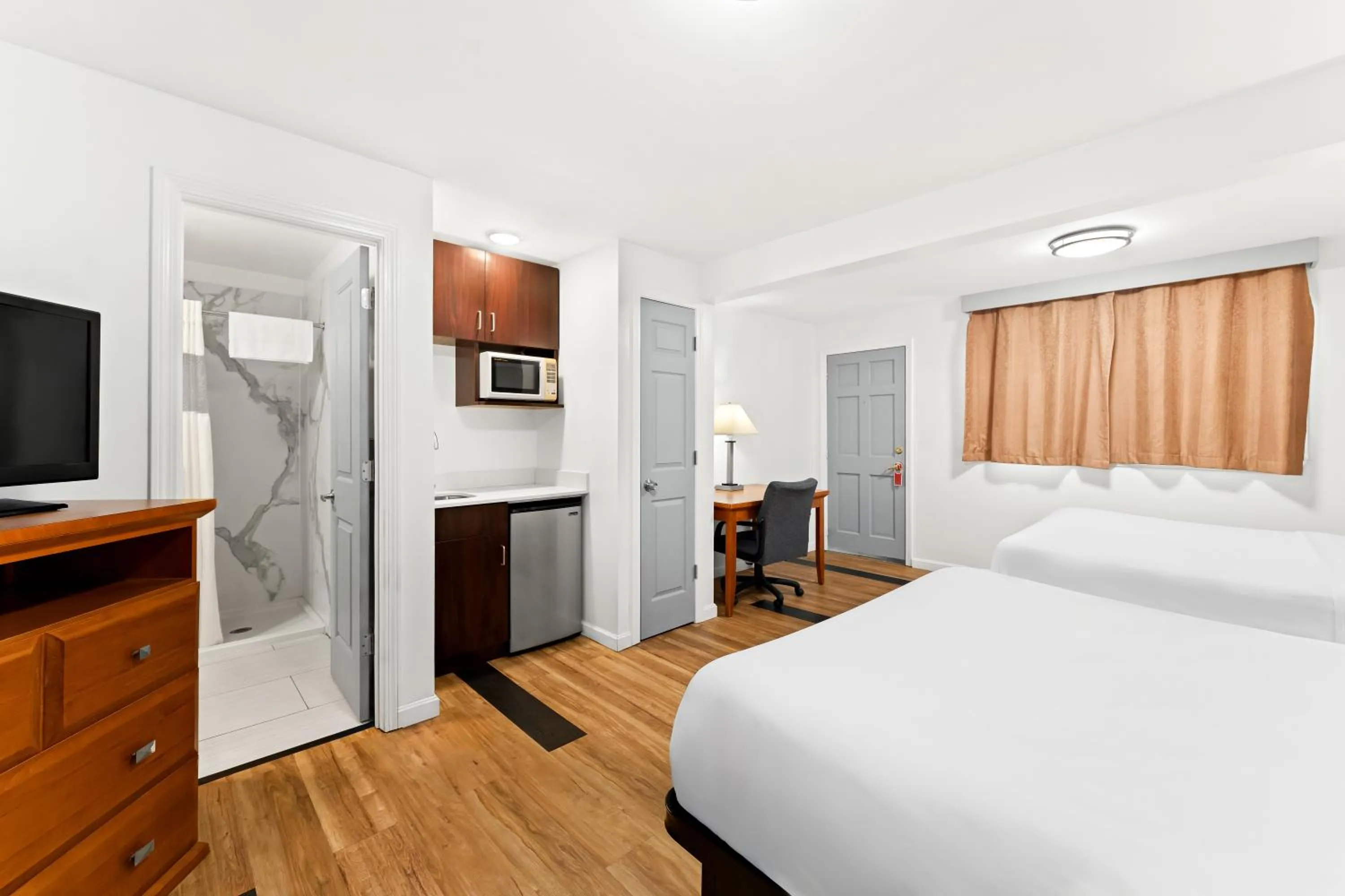 Bed in Americas Best Value Inn Stonington Mystic