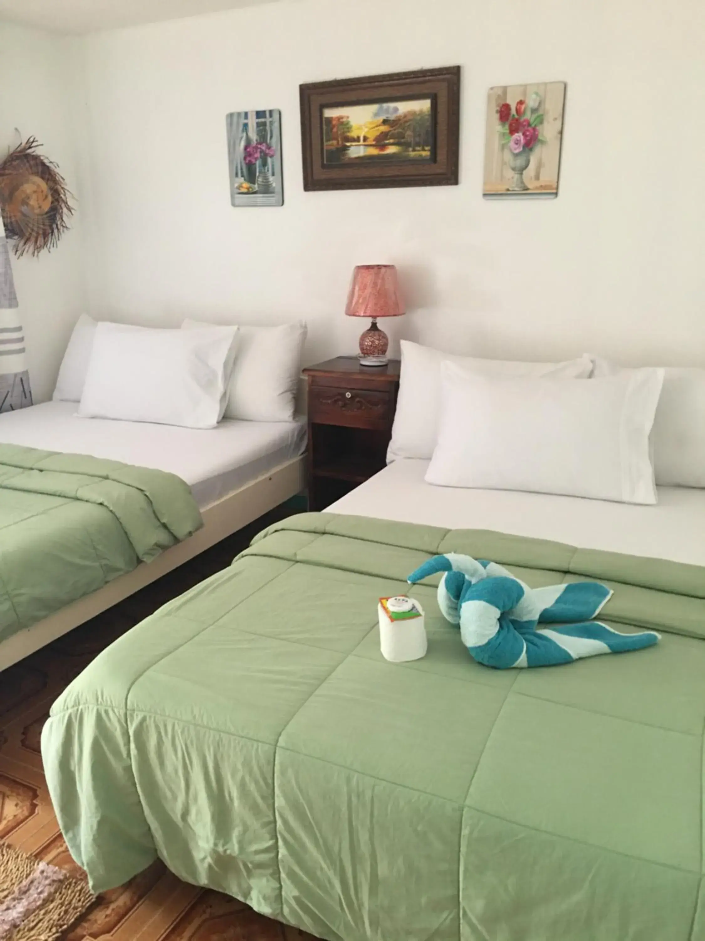 Bed in Mabuhay Thresher Dive Resort Bed in Mabuhay Thresher Dive Resort