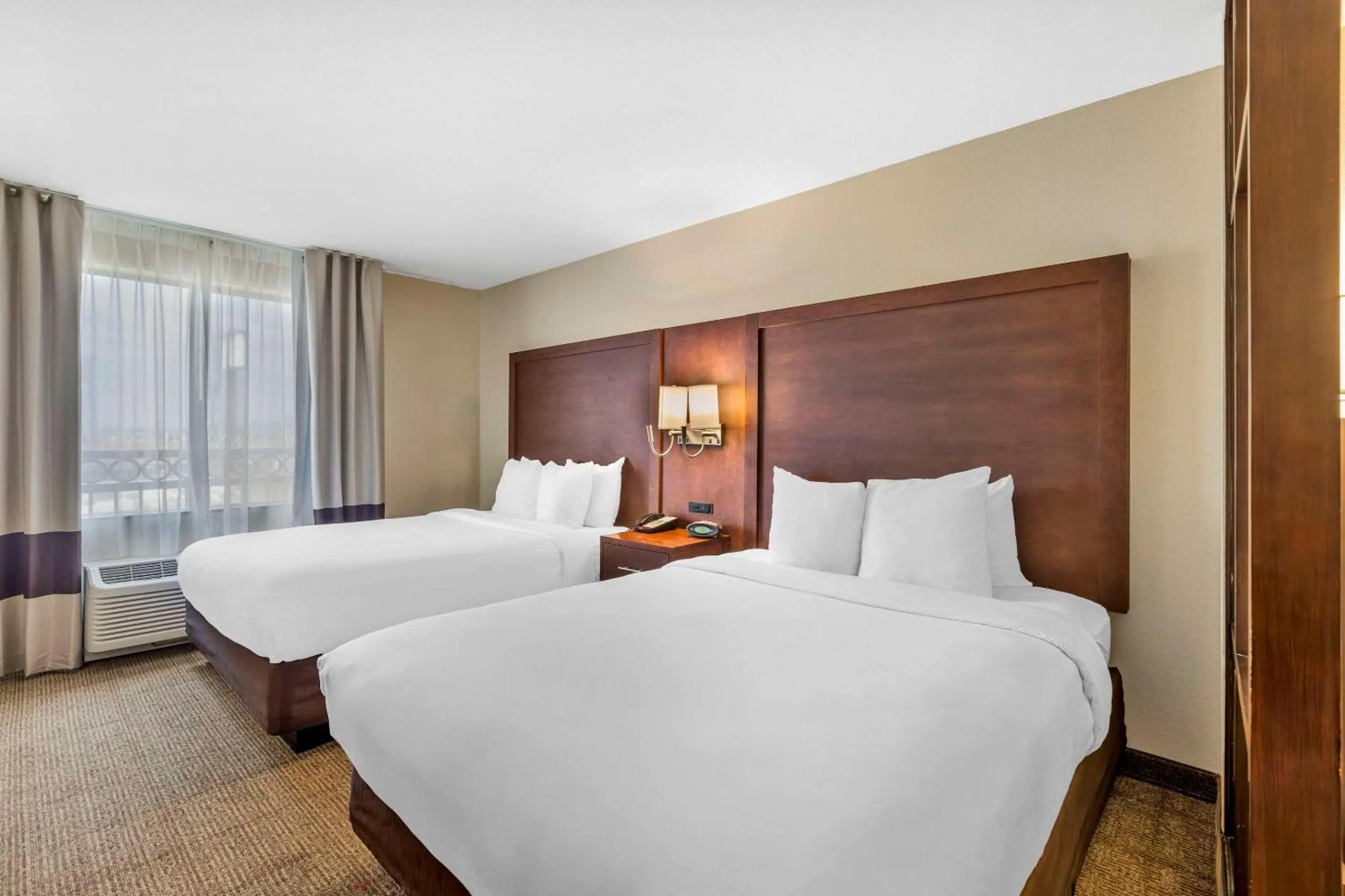 Bed in Comfort Suites Blythe