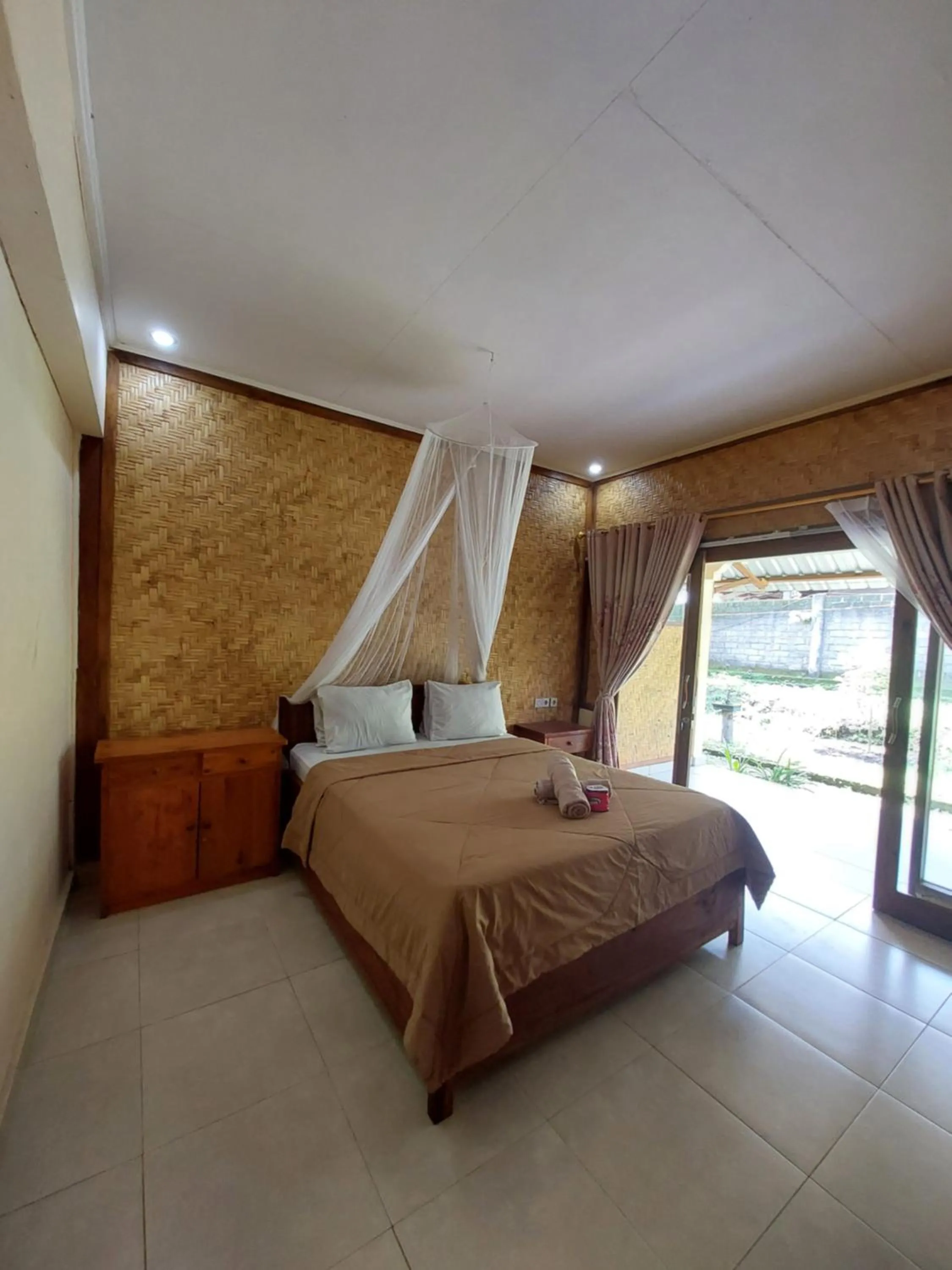 Bed in Ila Homestay