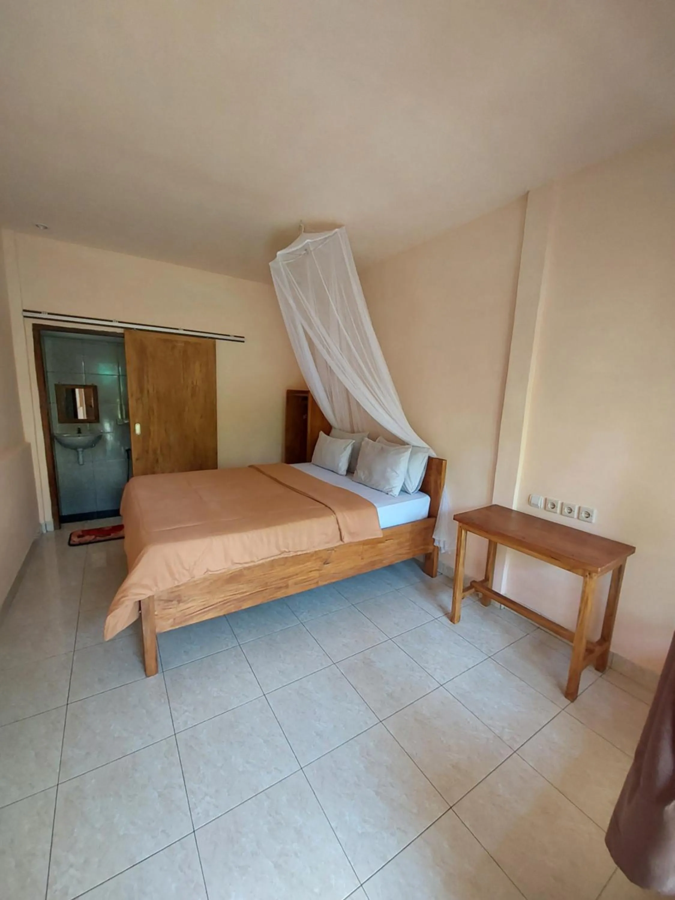 Bed in Ila Homestay