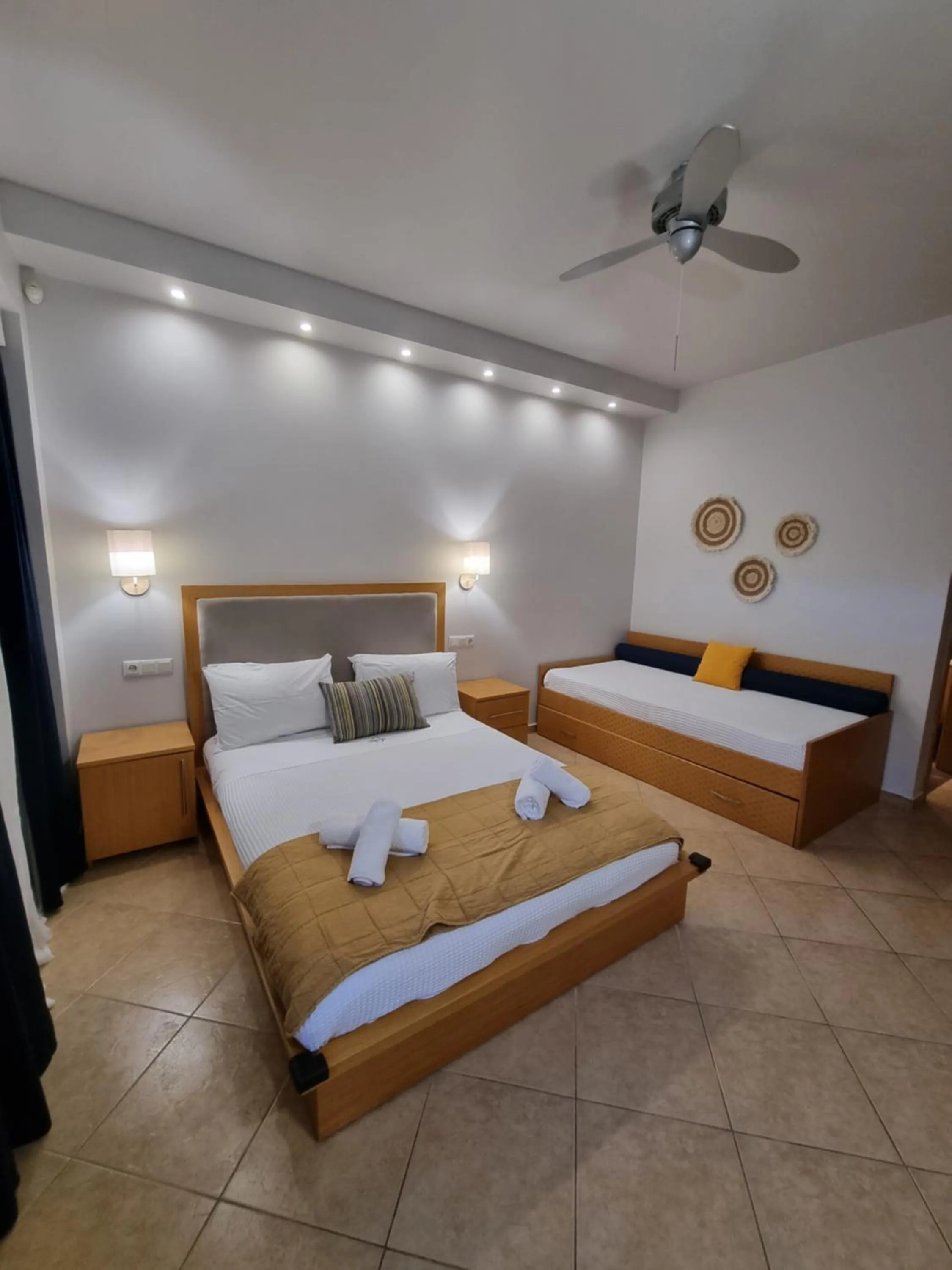 Bed in GreenHill Holiday Suites
