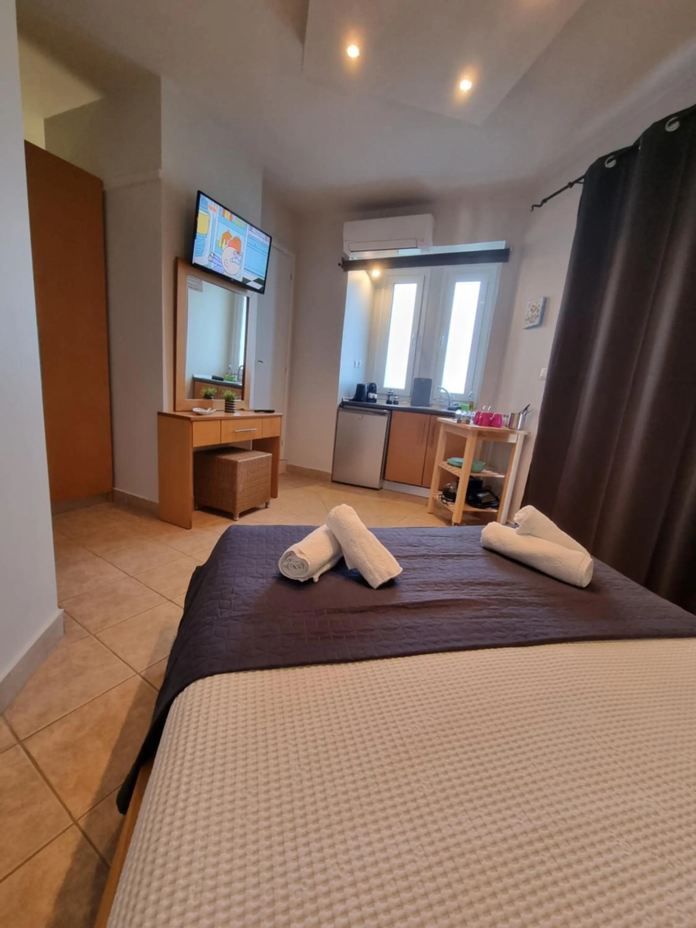 Bed in GreenHill Holiday Suites