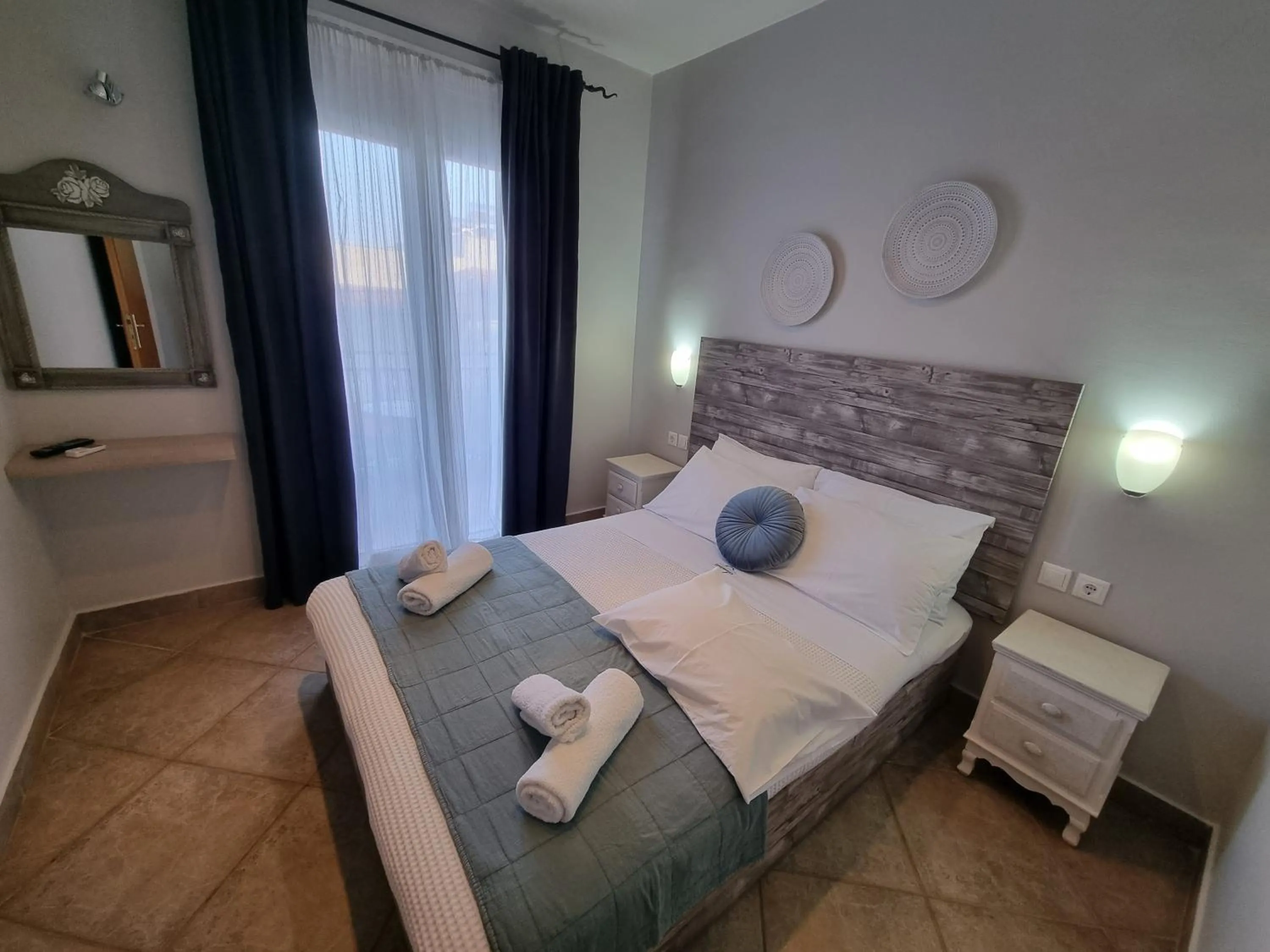 Bed in GreenHill Holiday Suites